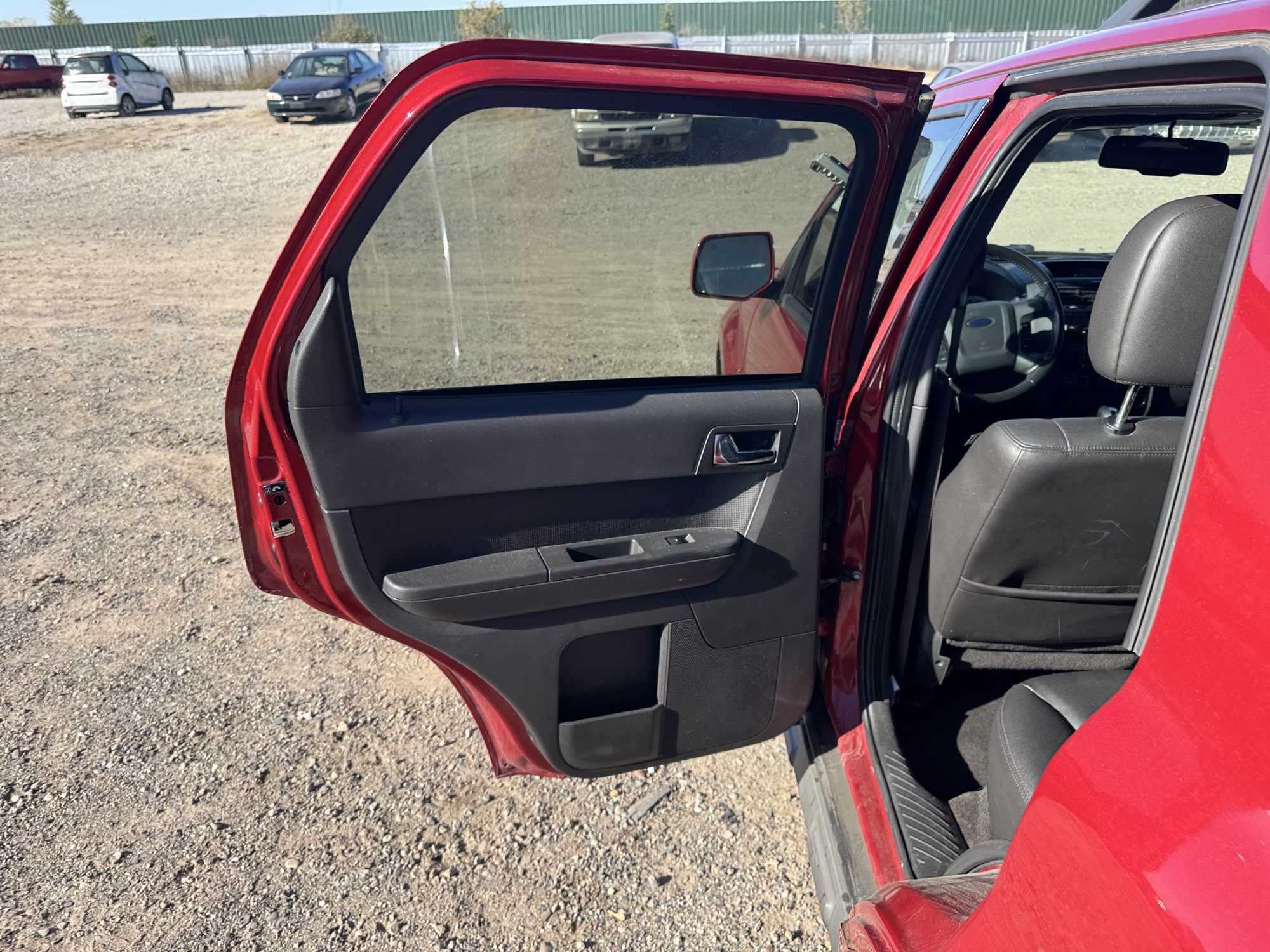 2009 ford escape limited-4wd-v6 with 171099 miles for sale near Elk River, Minnesota 106844_25_drv_rear_door_panel.jpg