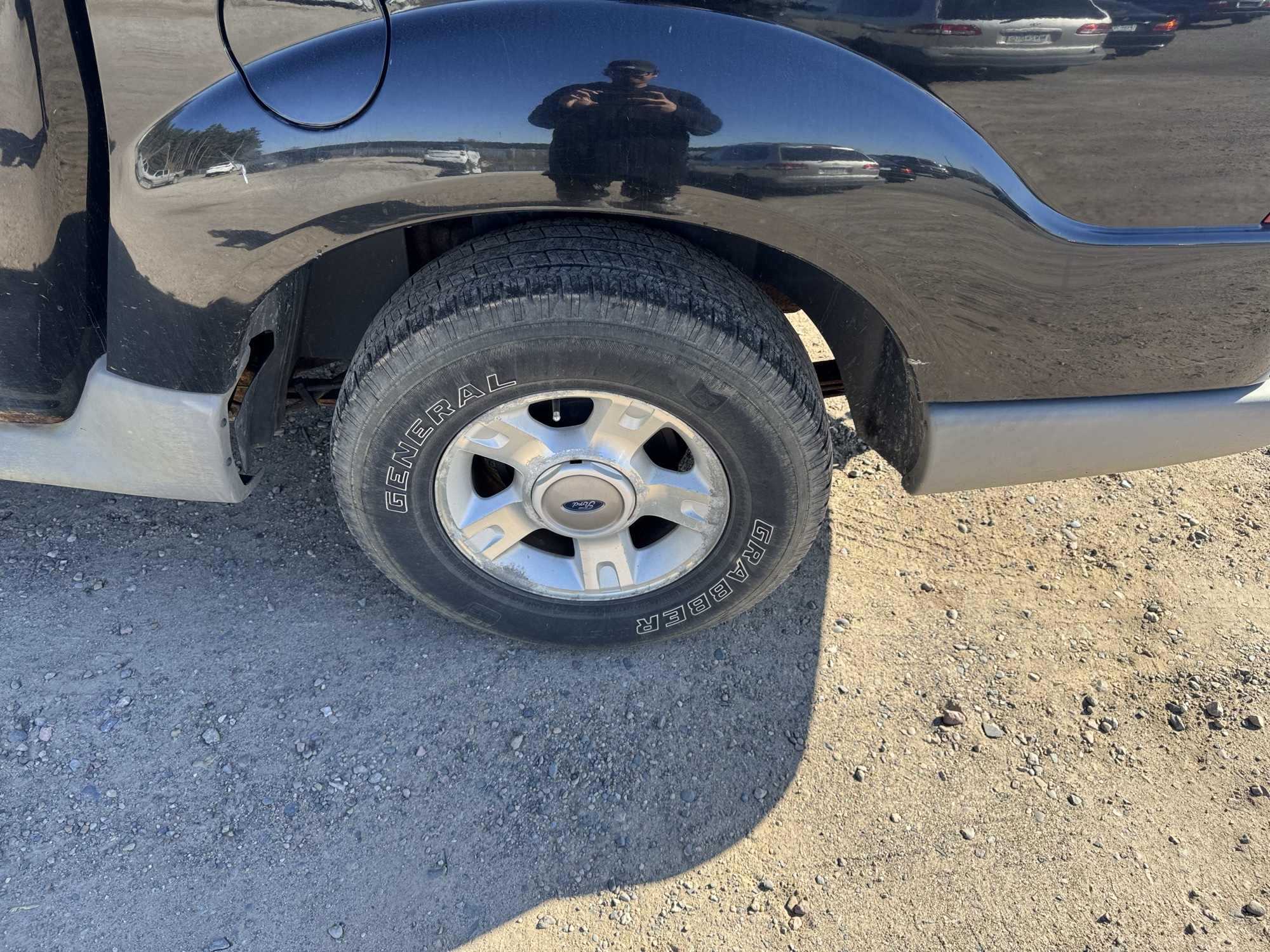 2002 ford explorer-sport-trac 4wd-value---200a with 189553 miles for sale near Elk River, Minnesota 106845_13_rear_drv_wheel.jpg
