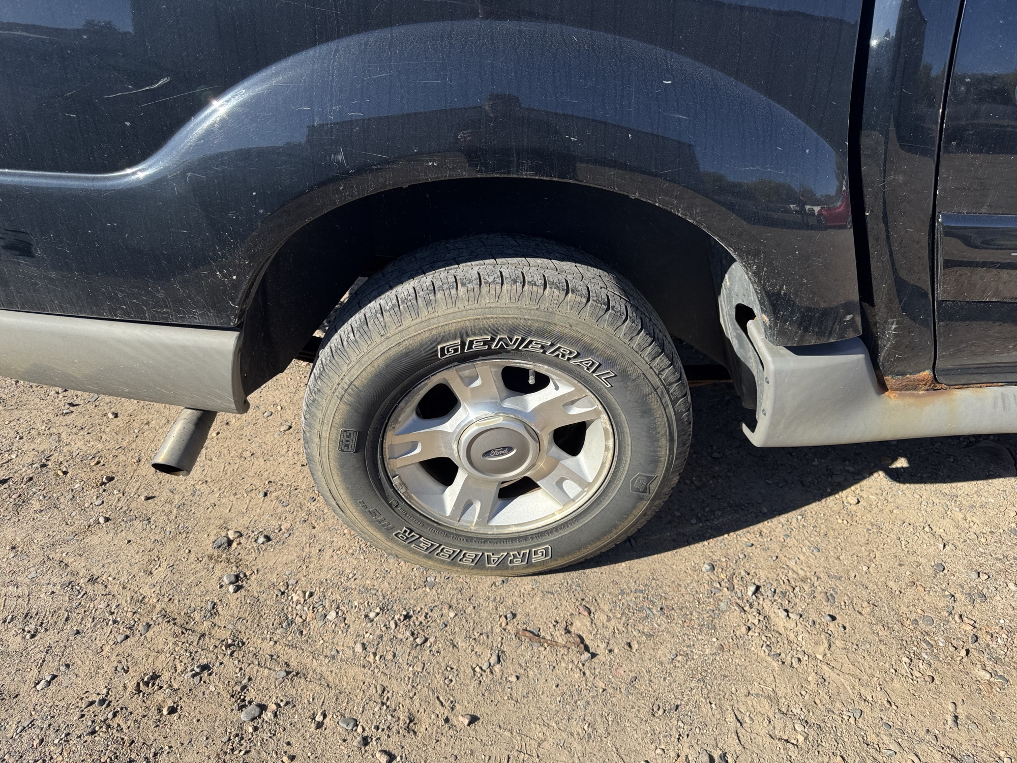 2002 ford explorer-sport-trac 4wd-value---200a with 189553 miles for sale near Elk River, Minnesota 106845_14_rear_pass_wheel.jpg