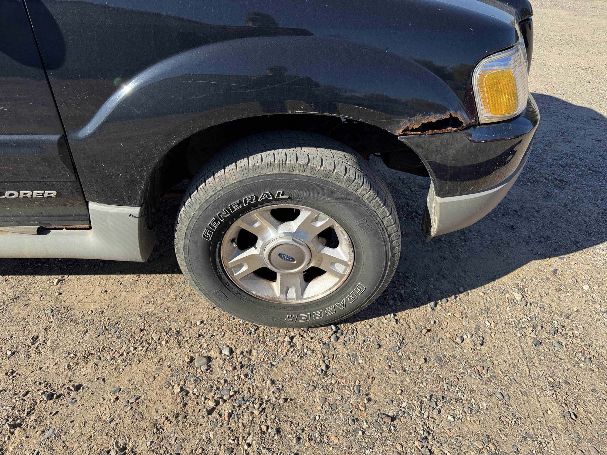 2002 ford explorer-sport-trac 4wd-value---200a with 189553 miles for sale near Elk River, Minnesota 106845_15_front_pass_wheel.jpg