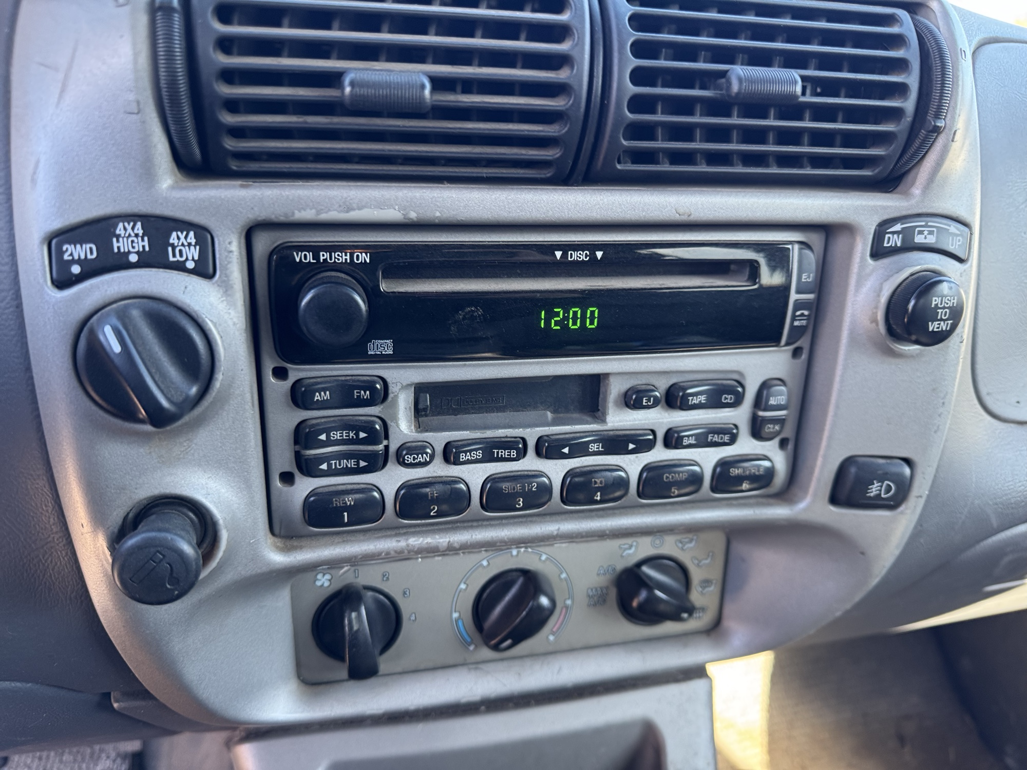 2002 ford explorer-sport-trac 4wd-value---200a with 189553 miles for sale near Elk River, Minnesota 106845_39_radio_closeup.jpg