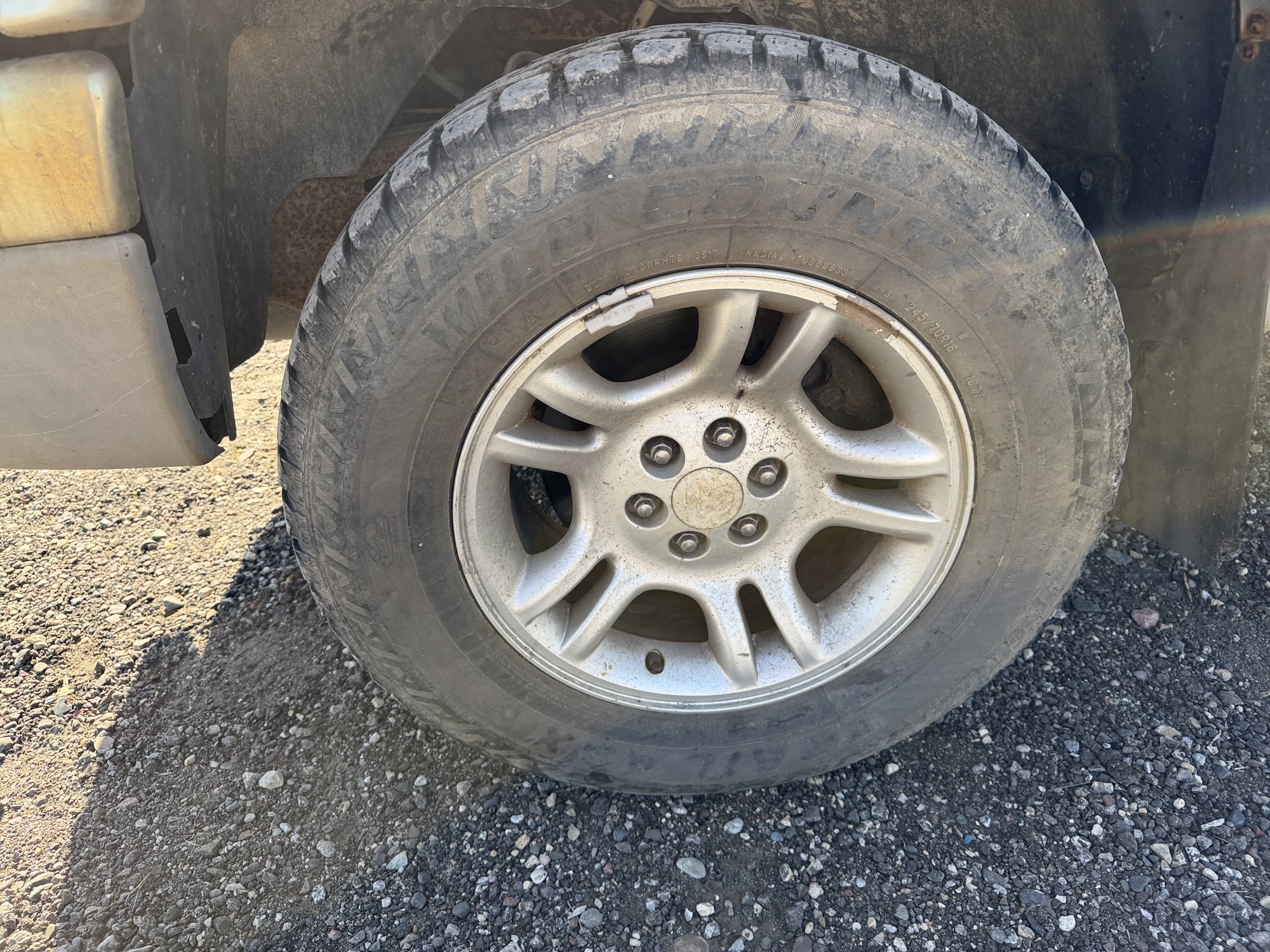 2004 dodge dakota slt-club-cab-4wd with 144071 miles for sale near Elk River, Minnesota 106853_12_drv_front_wheel.jpg