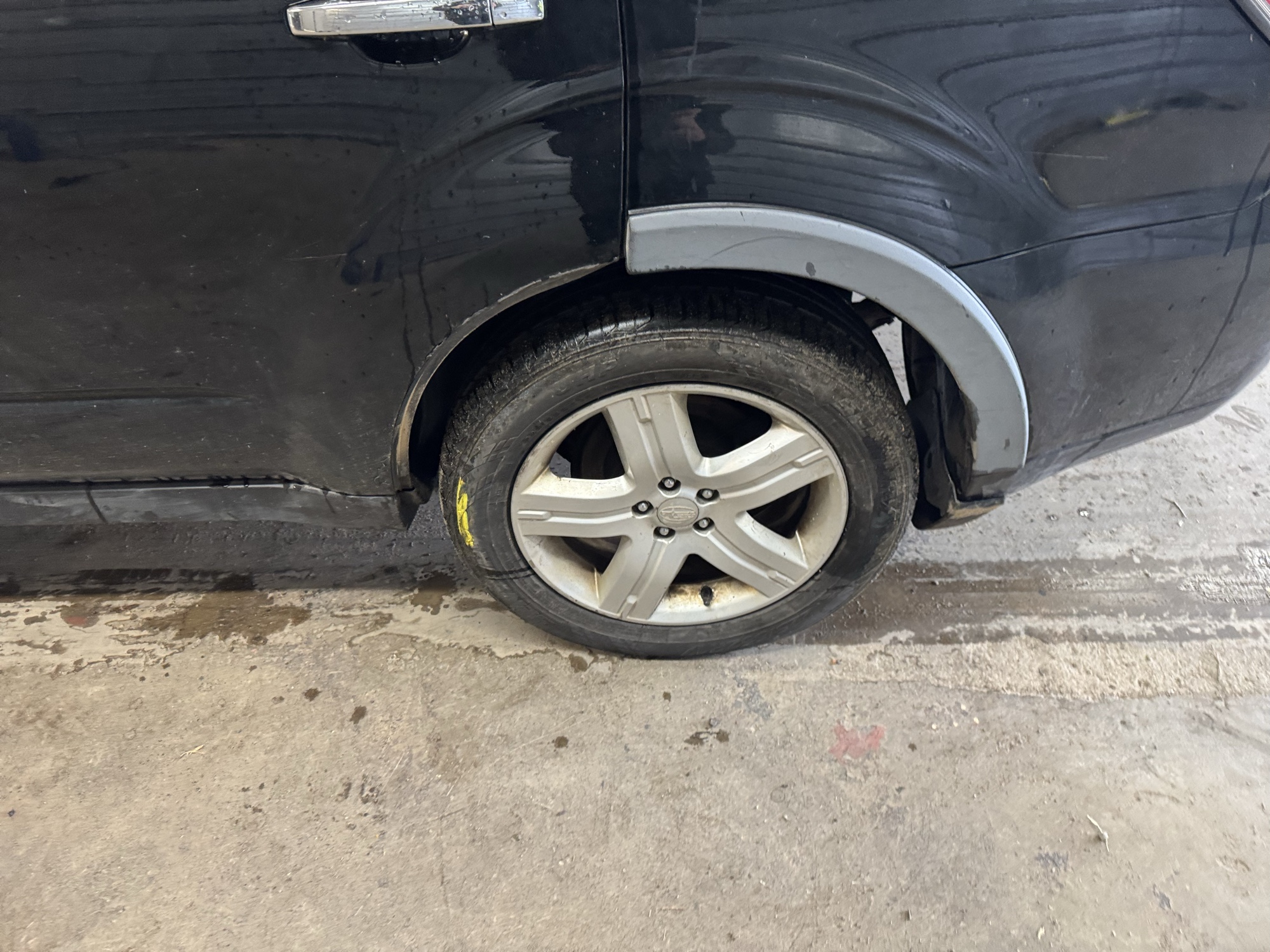 2010 subaru forester 2.5x-limited with 187276 miles for sale near Elk River, Minnesota 106854_13_rear_drv_wheel.jpg