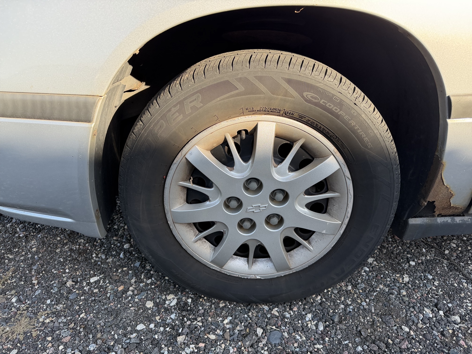 2004 chevrolet impala base with 134989 miles for sale near Elk River, Minnesota 106856_12_drv_front_wheel.jpg