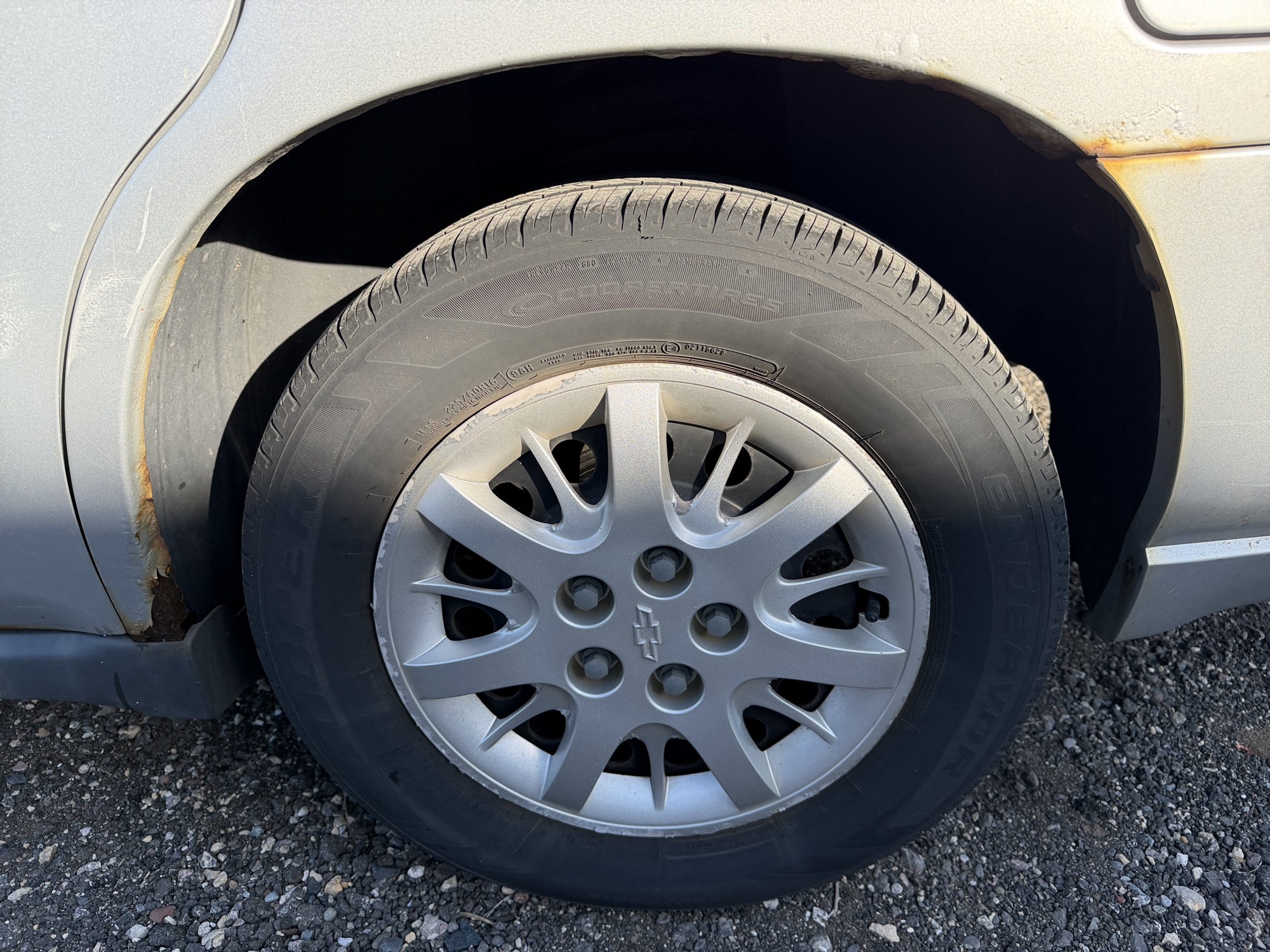 2004 chevrolet impala base with 134989 miles for sale near Elk River, Minnesota 106856_13_rear_drv_wheel.jpg