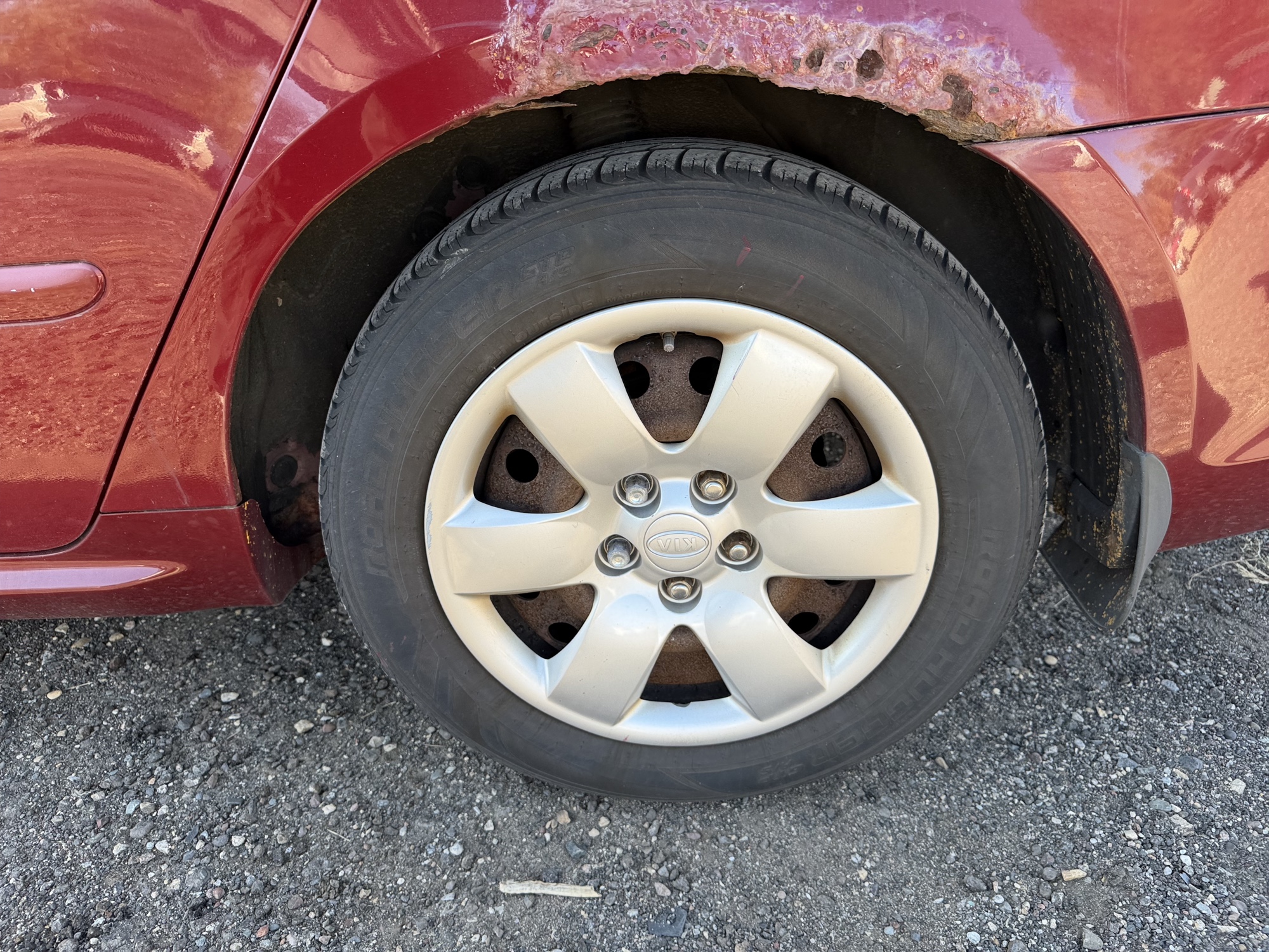 2009 kia optima ex with 206662 miles for sale near Elk River, Minnesota 106857_13_rear_drv_wheel.jpg