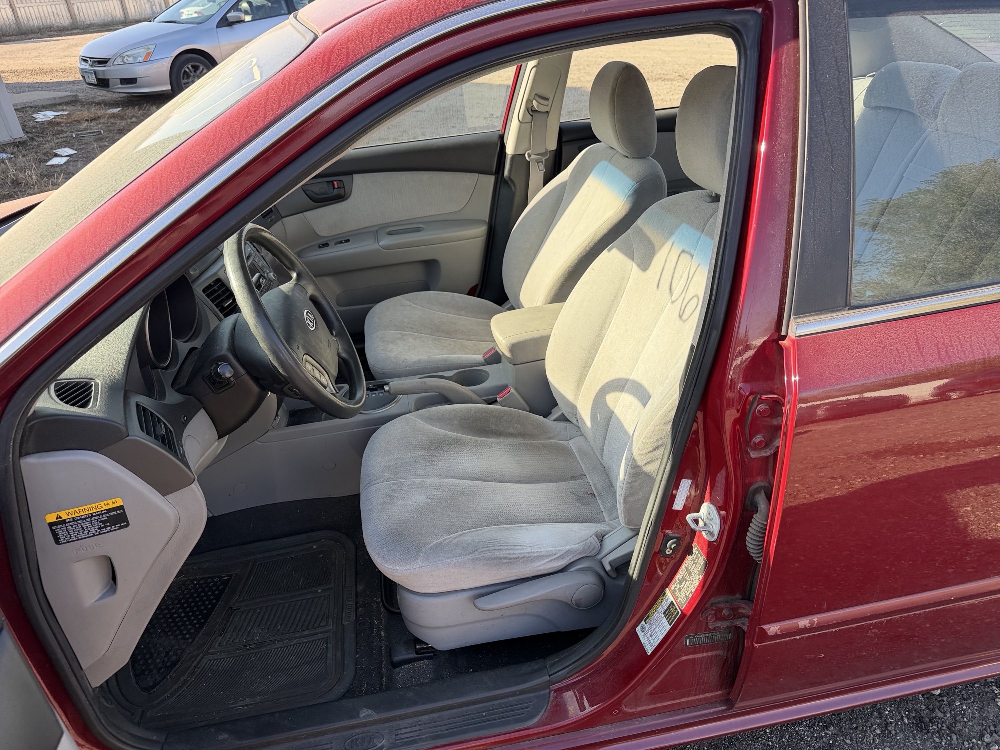 2009 kia optima ex with 206662 miles for sale near Elk River, Minnesota 106857_22_driver_seat.jpg