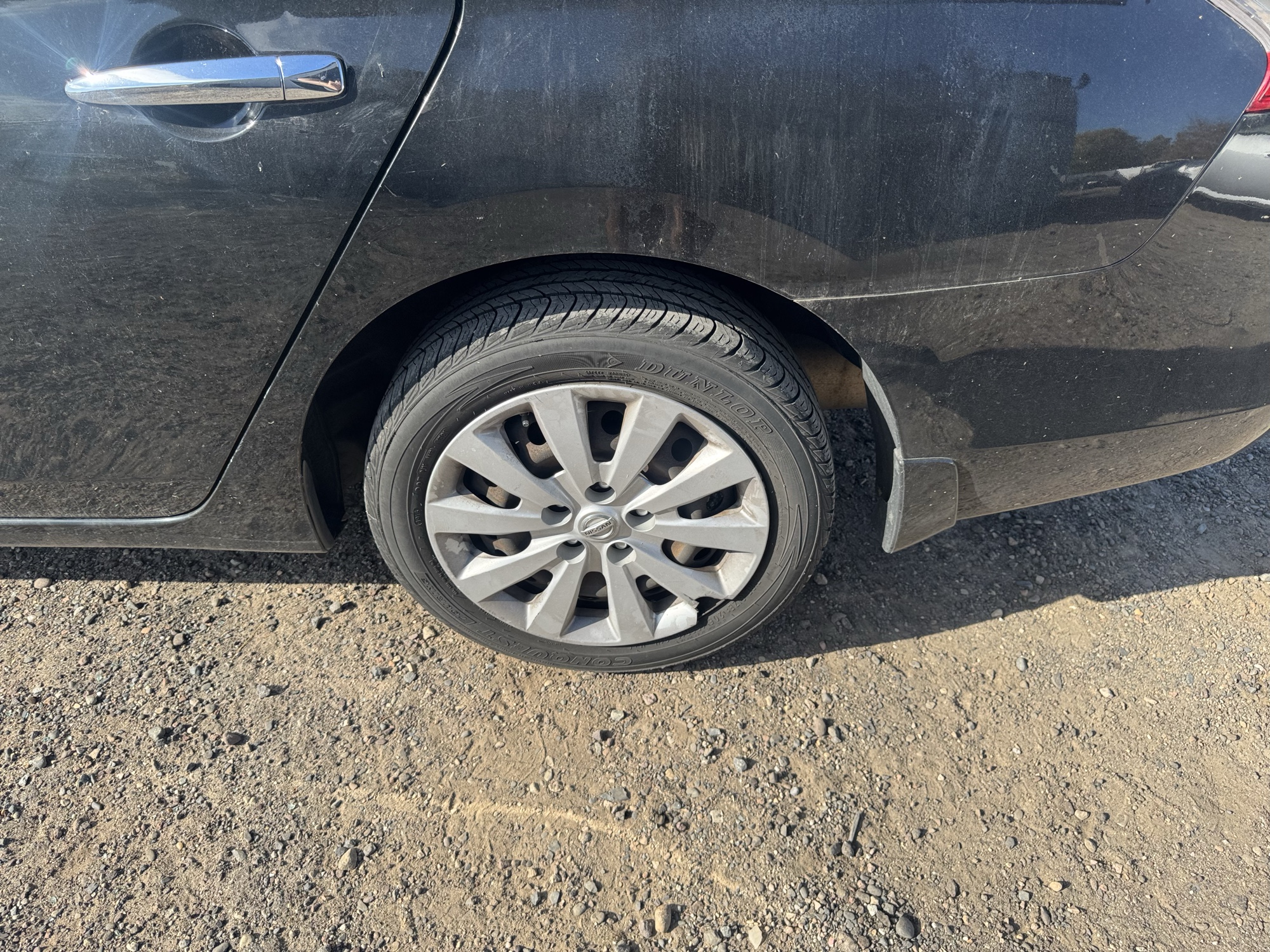 2015 nissan sentra s-6mt with 90240 miles for sale near Elk River, Minnesota 106860_13_rear_drv_wheel.jpg