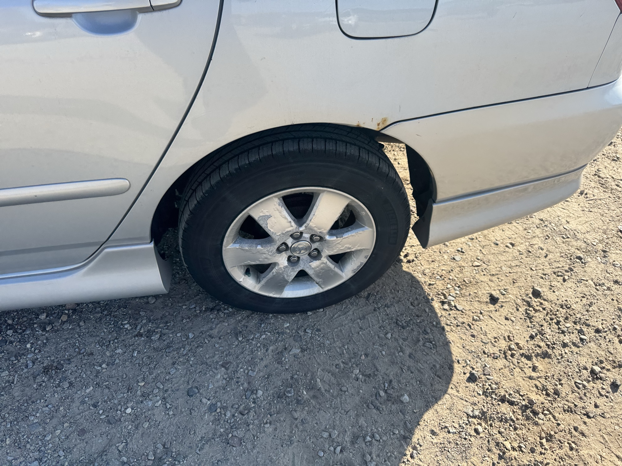 2007 toyota corolla ce with 150675 miles for sale near Elk River, Minnesota 106861_13_rear_drv_wheel.jpg