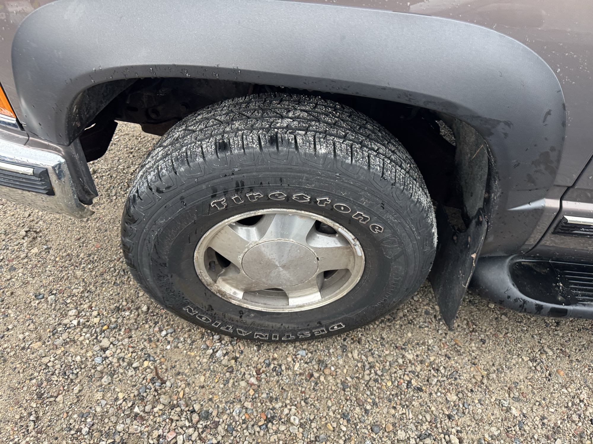 1997 chevrolet suburban k1500-4wd with 152445 miles for sale near Elk River, Minnesota 106866_12_drv_front_wheel.jpg