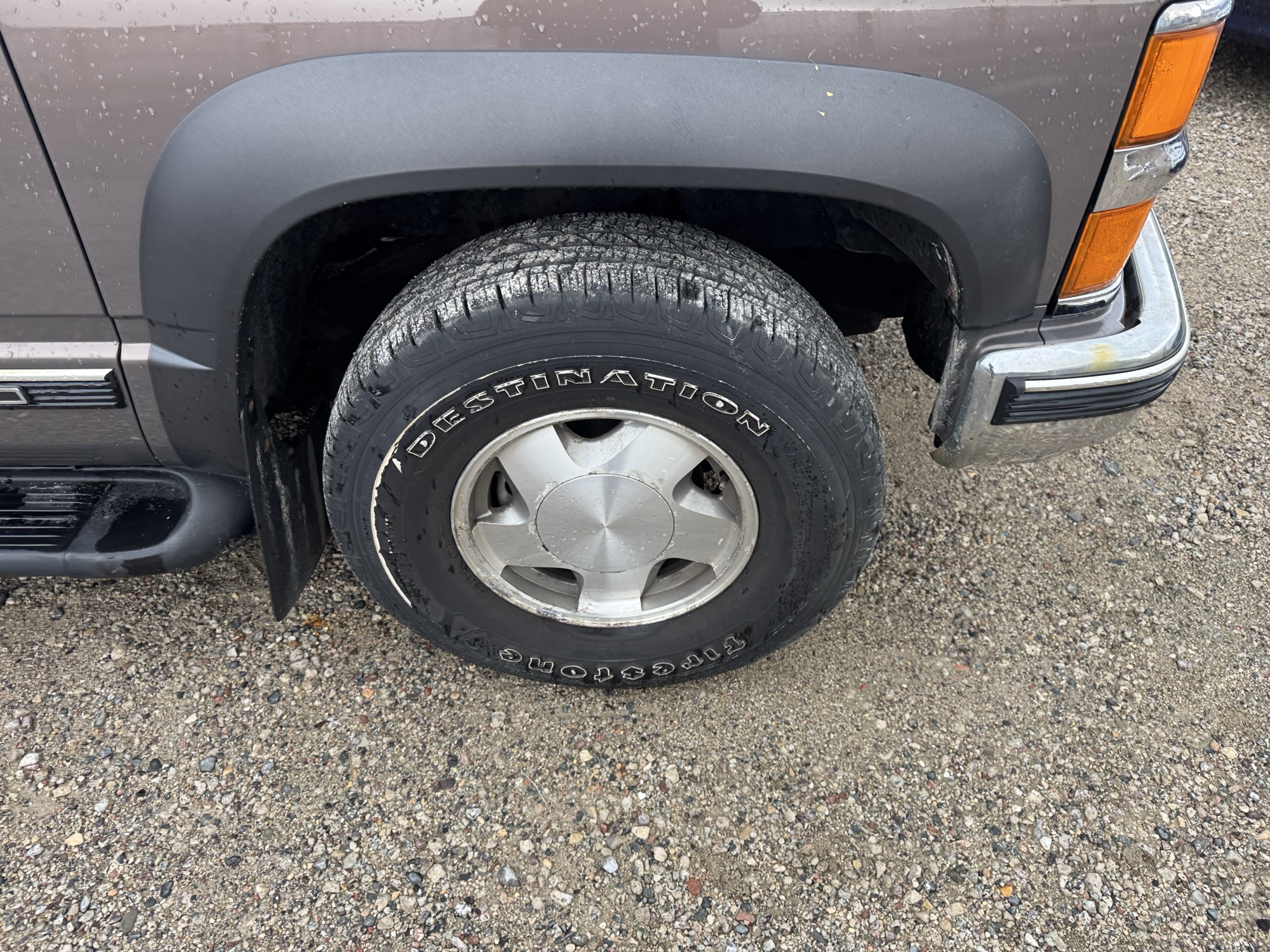 1997 chevrolet suburban k1500-4wd with 152445 miles for sale near Elk River, Minnesota 106866_15_front_pass_wheel.jpg
