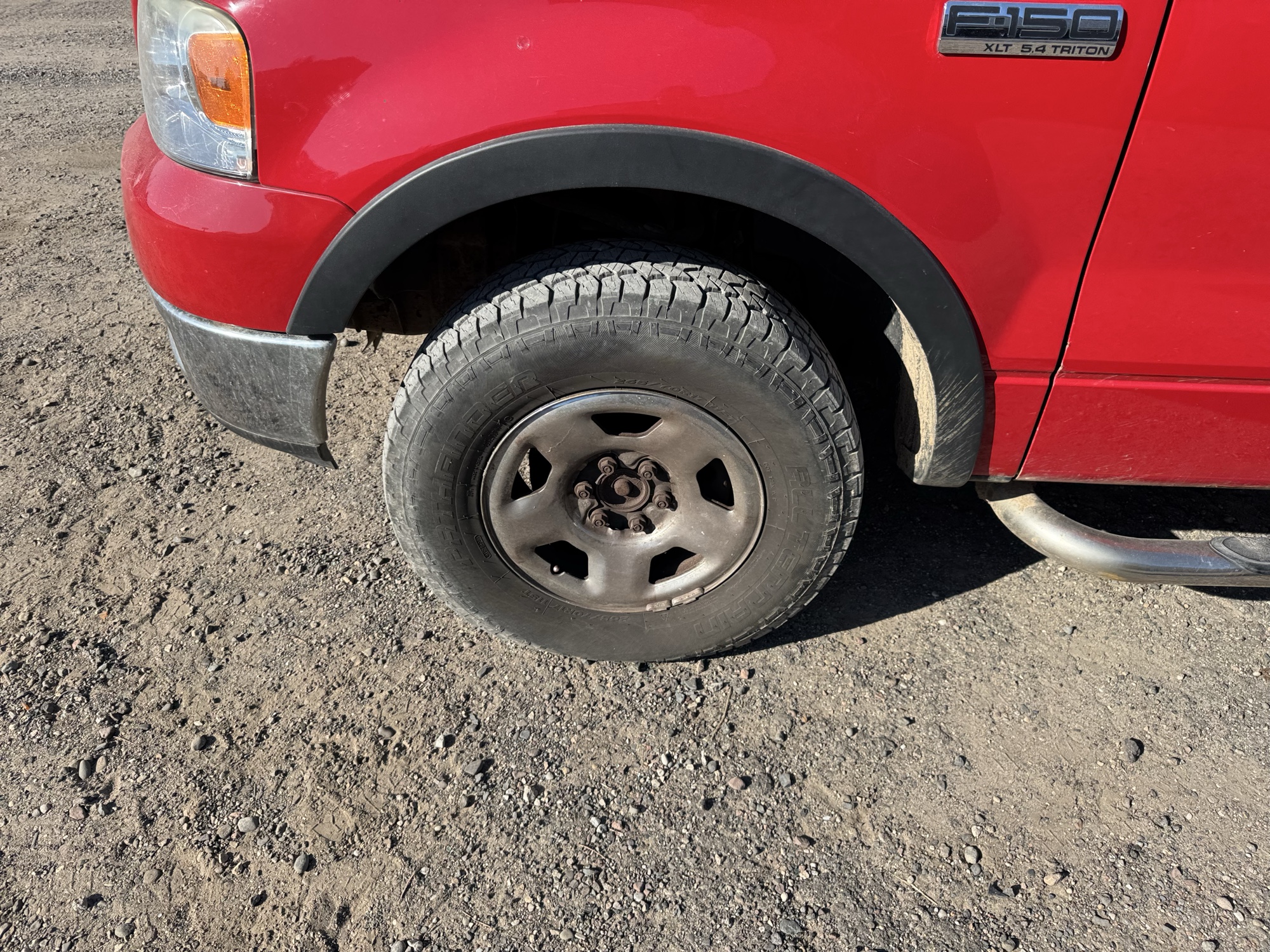 2005 ford f-150 fx4-supercab-4wd with 132299 miles for sale near Elk River, Minnesota 106871_12_drv_front_wheel.jpg