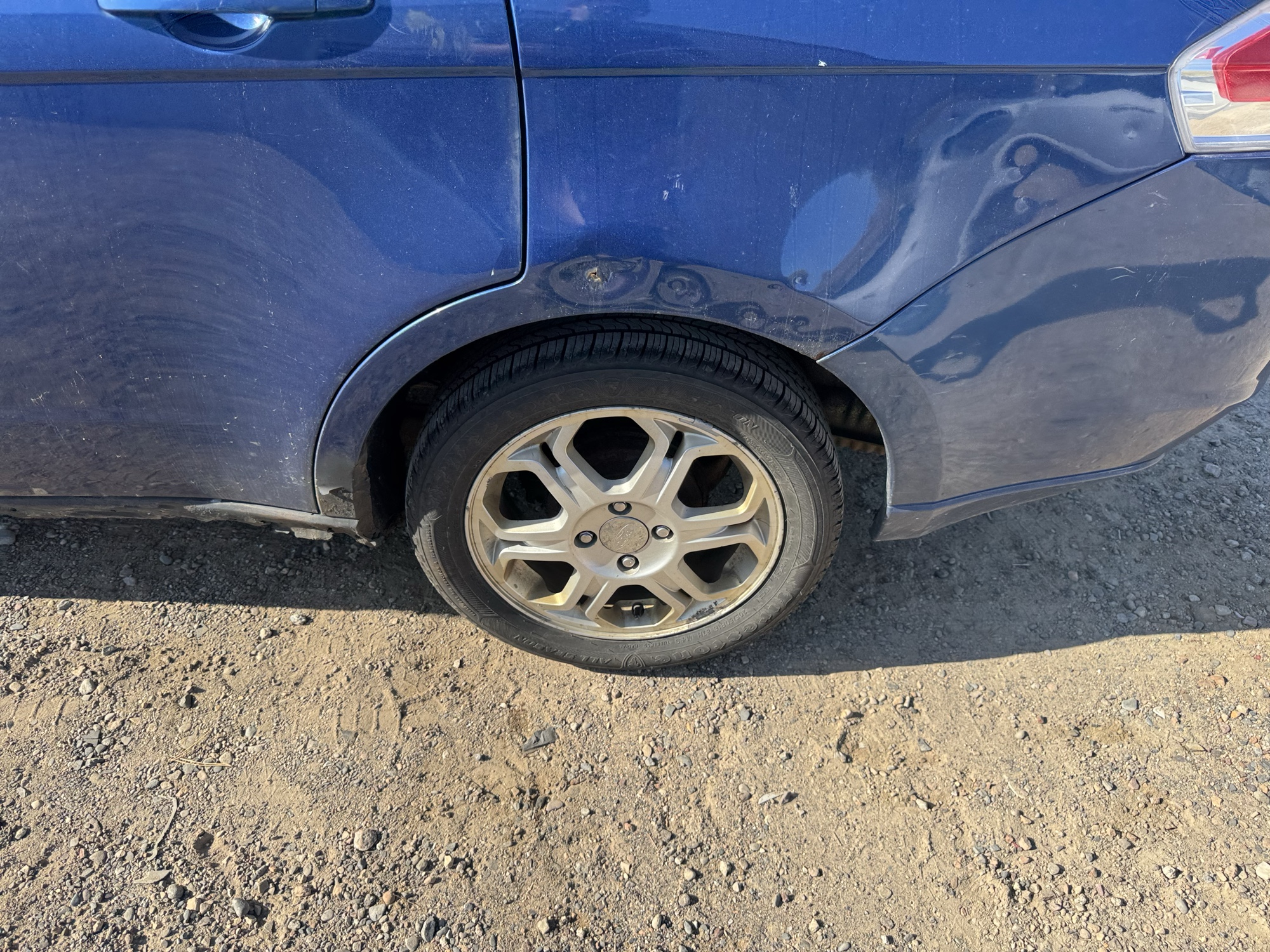 2008 ford focus ses-sedan with 282409 miles for sale near Elk River, Minnesota 106875_13_rear_drv_wheel.jpg