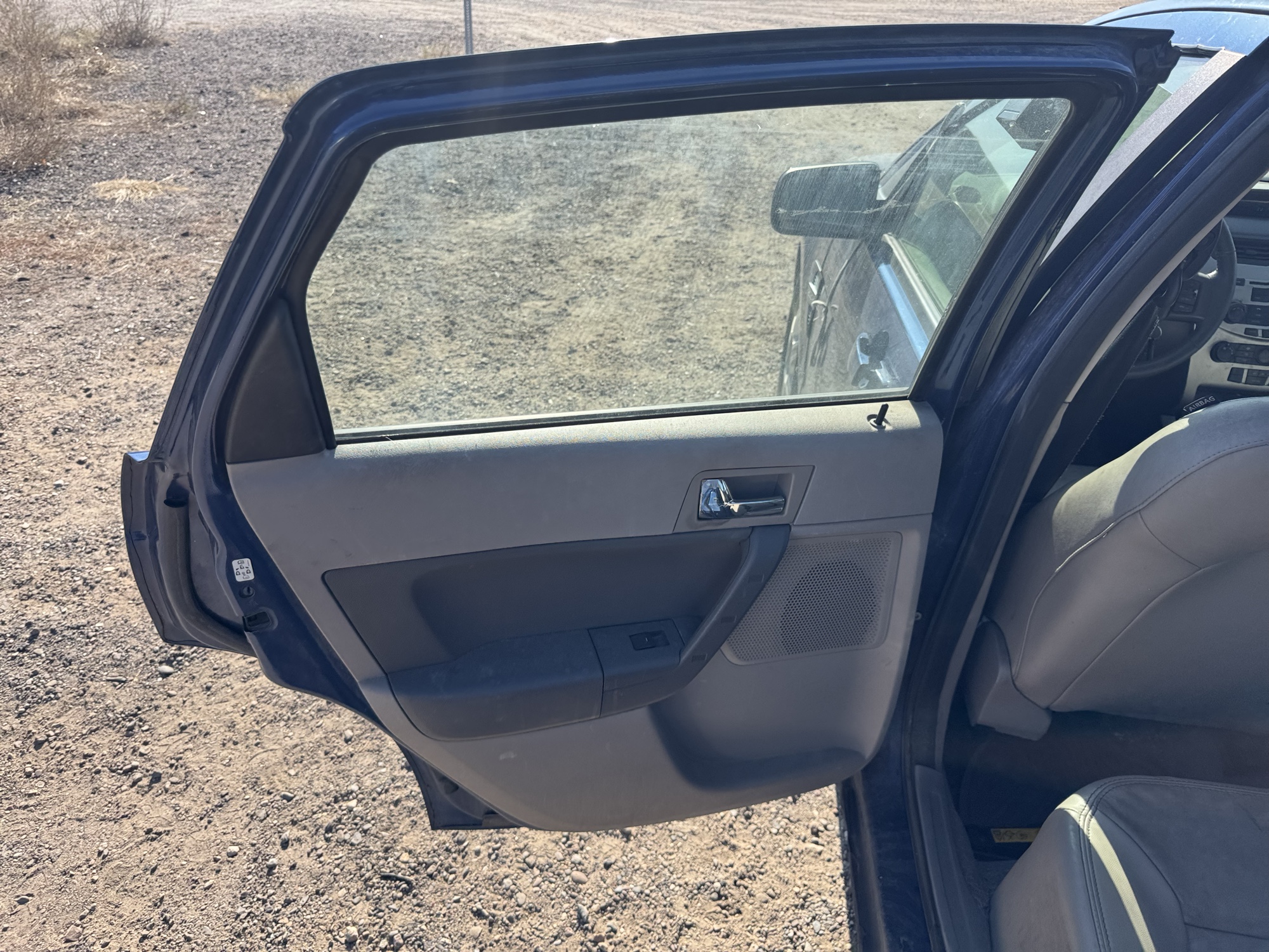 2008 ford focus ses-sedan with 282409 miles for sale near Elk River, Minnesota 106875_25_drv_rear_door_panel.jpg