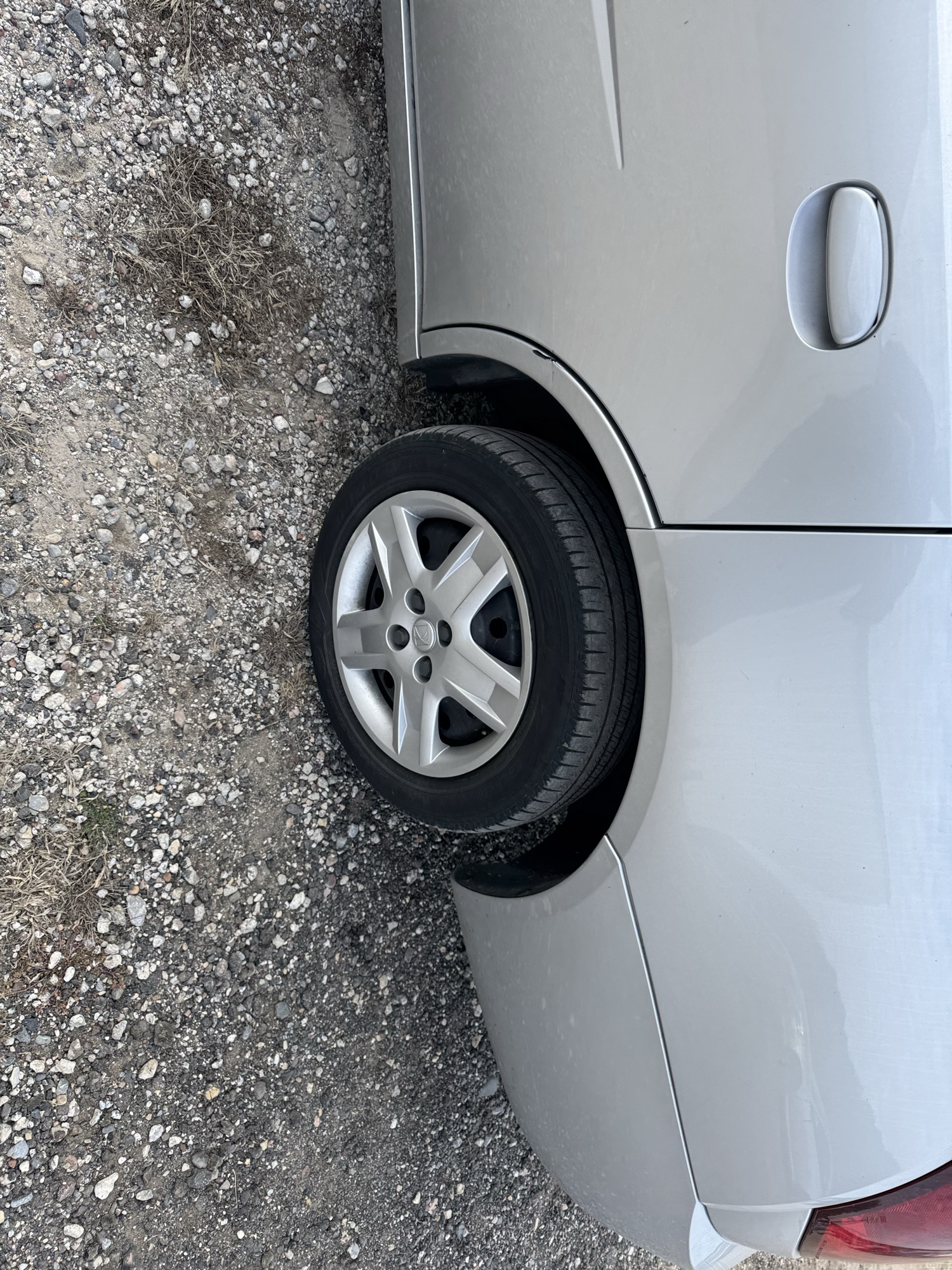 2007 saturn ion 2-sedan-automatic with 68235 miles for sale near Elk River, Minnesota 106877_13_rear_drv_wheel.jpg