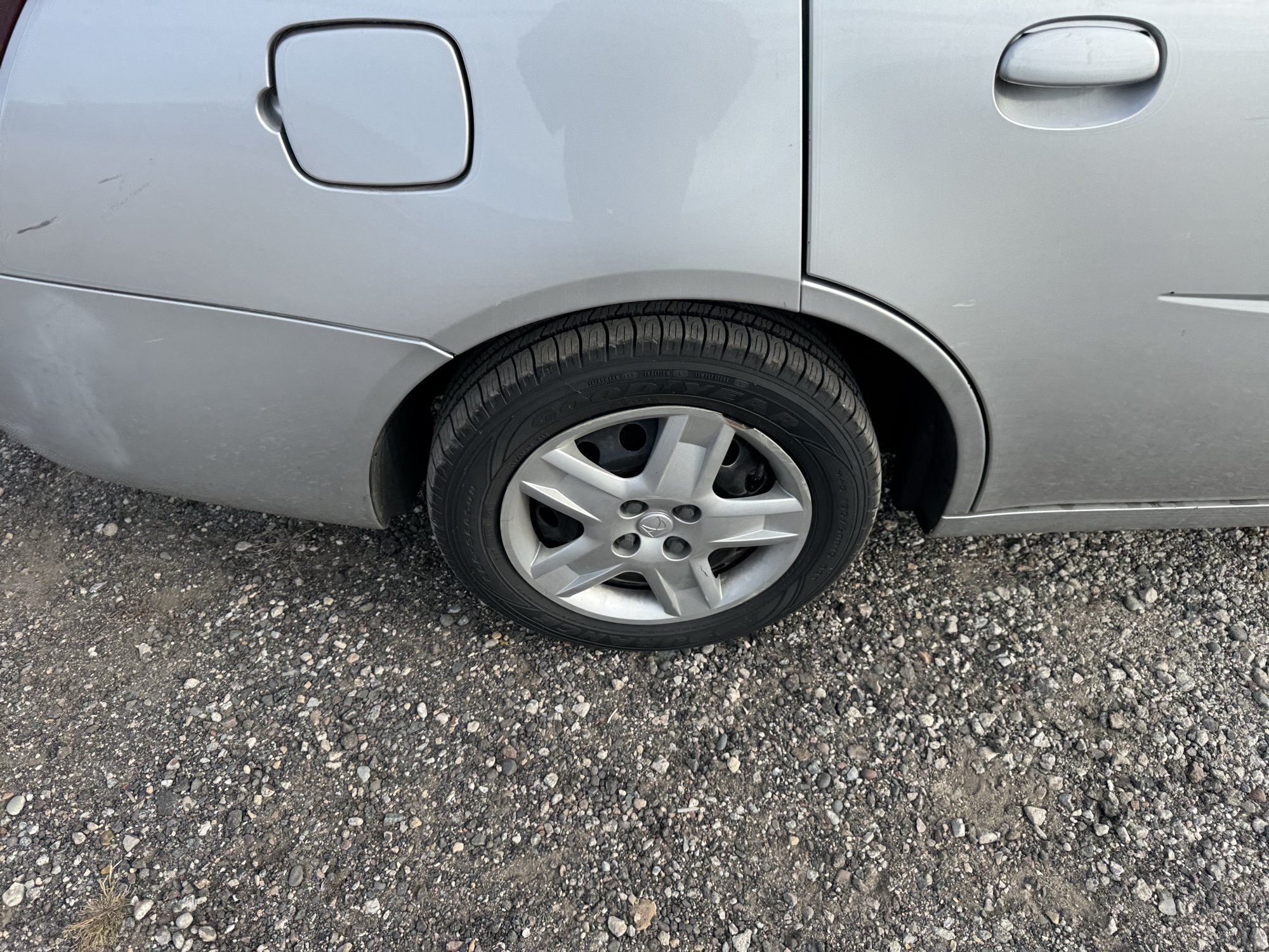 2007 saturn ion 2-sedan-automatic with 68235 miles for sale near Elk River, Minnesota 106877_14_rear_pass_wheel.jpg