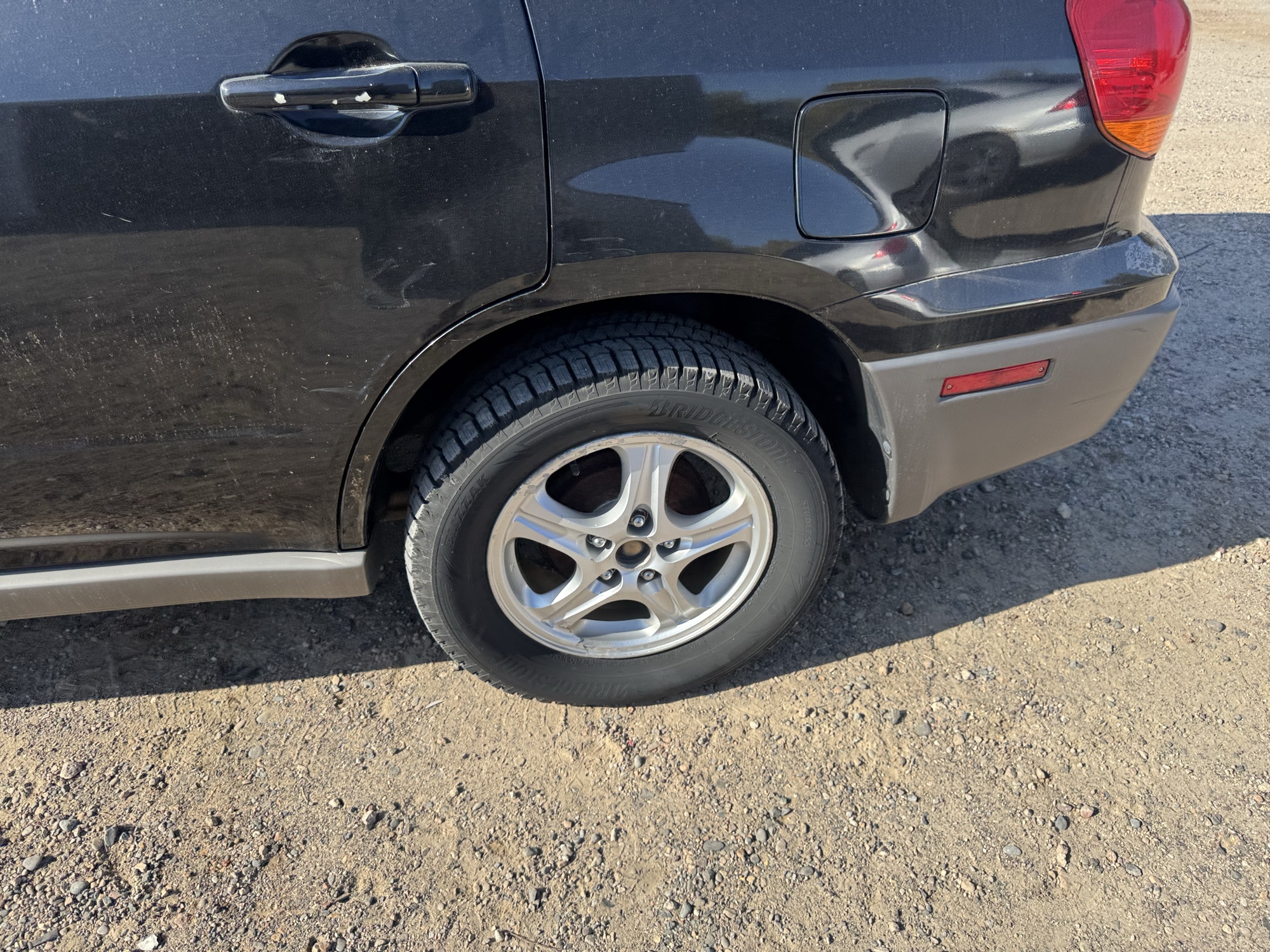 2003 mitsubishi outlander ls-2wd with 119005 miles for sale near Elk River, Minnesota 106879_13_rear_drv_wheel.jpg