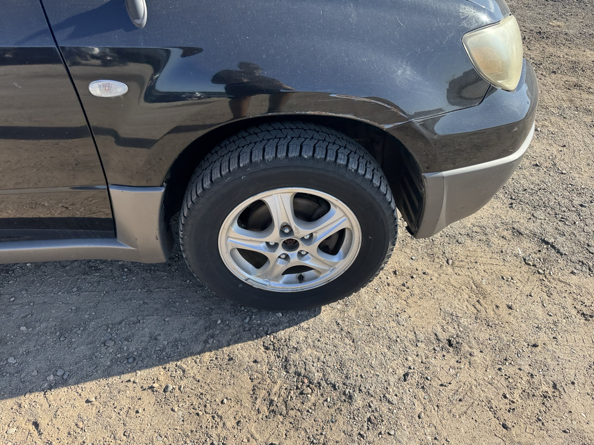 2003 mitsubishi outlander ls-2wd with 119005 miles for sale near Elk River, Minnesota 106879_15_front_pass_wheel.jpg