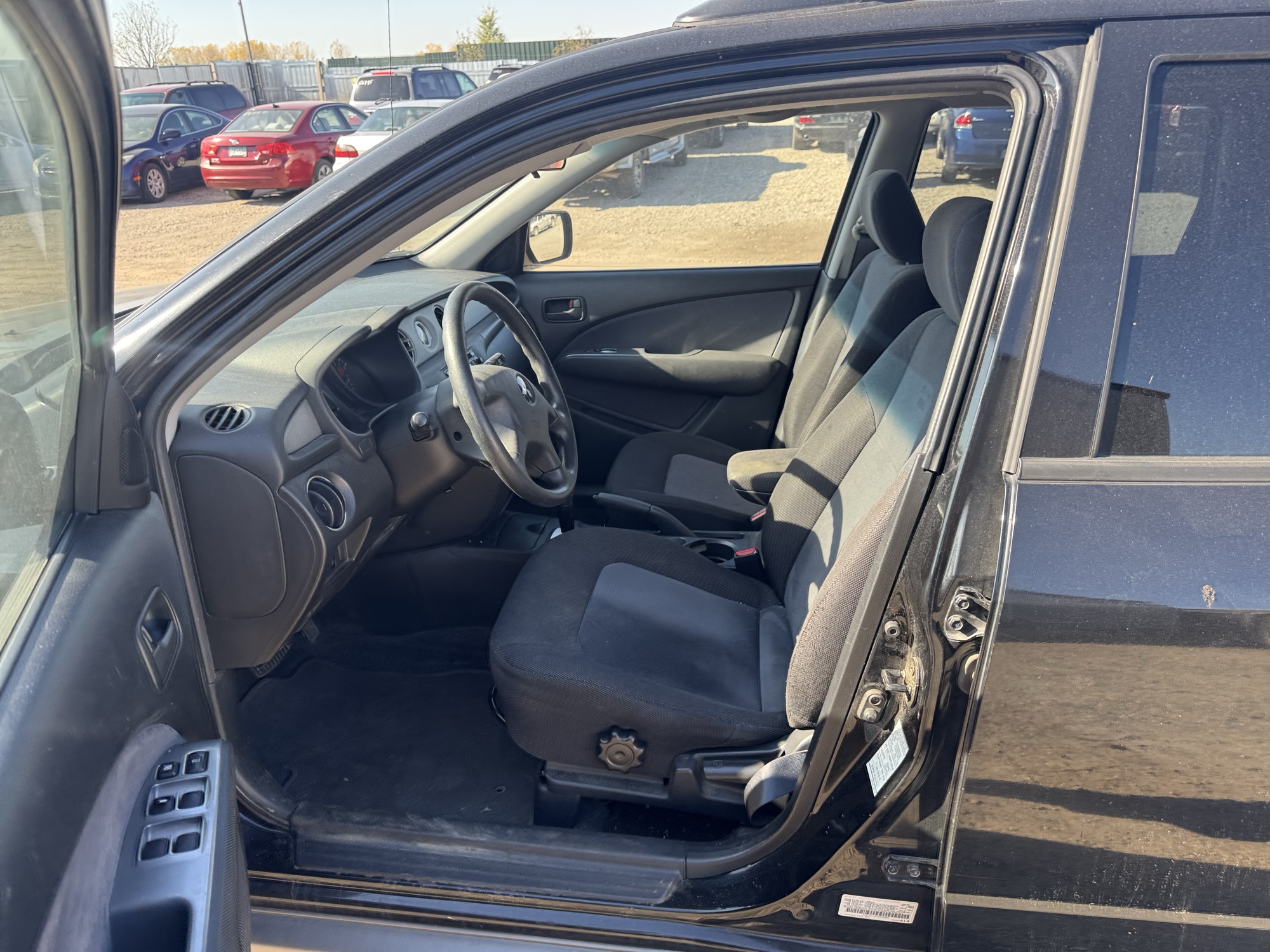 2003 mitsubishi outlander ls-2wd with 119005 miles for sale near Elk River, Minnesota 106879_22_driver_seat.jpg