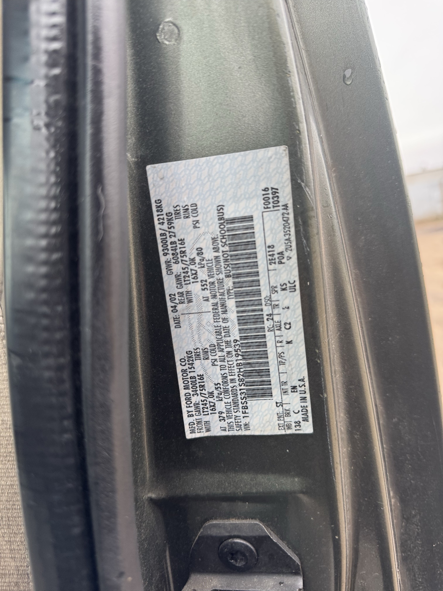 2002 ford econoline e350-extended with 237384 miles for sale near Elk River, Minnesota 106881_47_door_vin_sticker.jpg