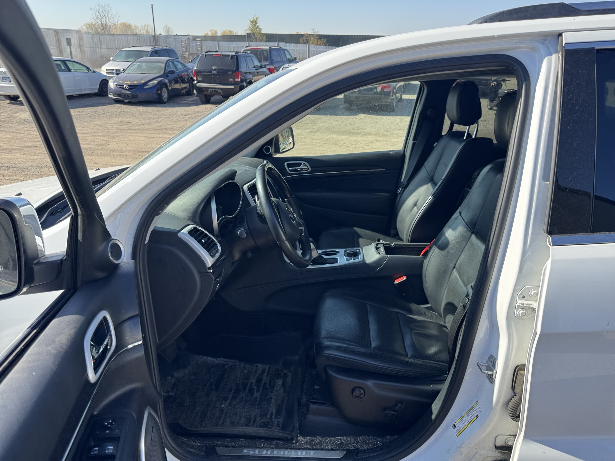2018 jeep grand-cherokee with 253786 miles for sale near Elk River, Minnesota 106890_22_driver_seat.jpg