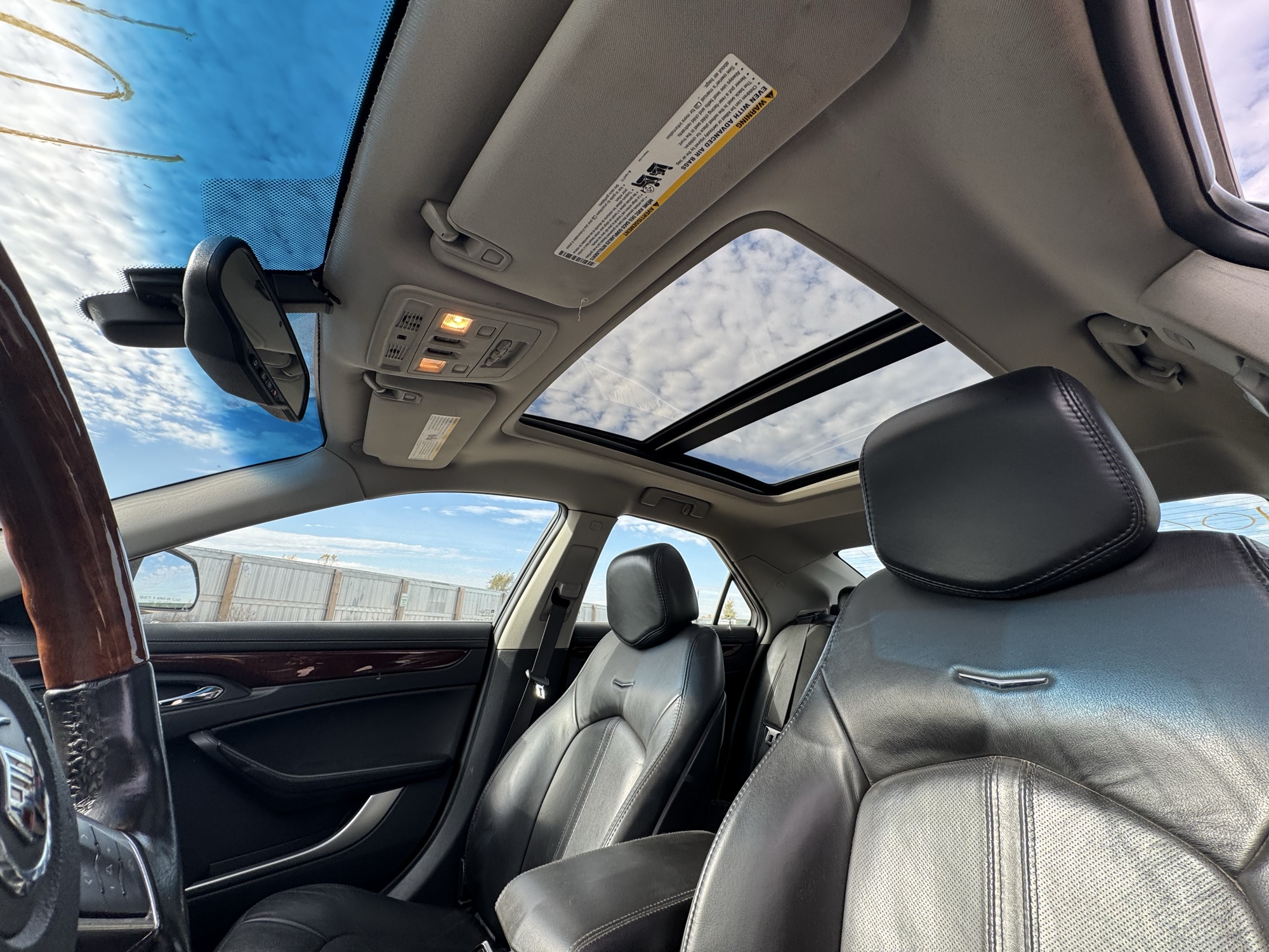2009 cadillac cts 3.6l-sidi-awd with 302214 miles for sale near Elk River, Minnesota 106894_35_headliner_sunroof.jpg