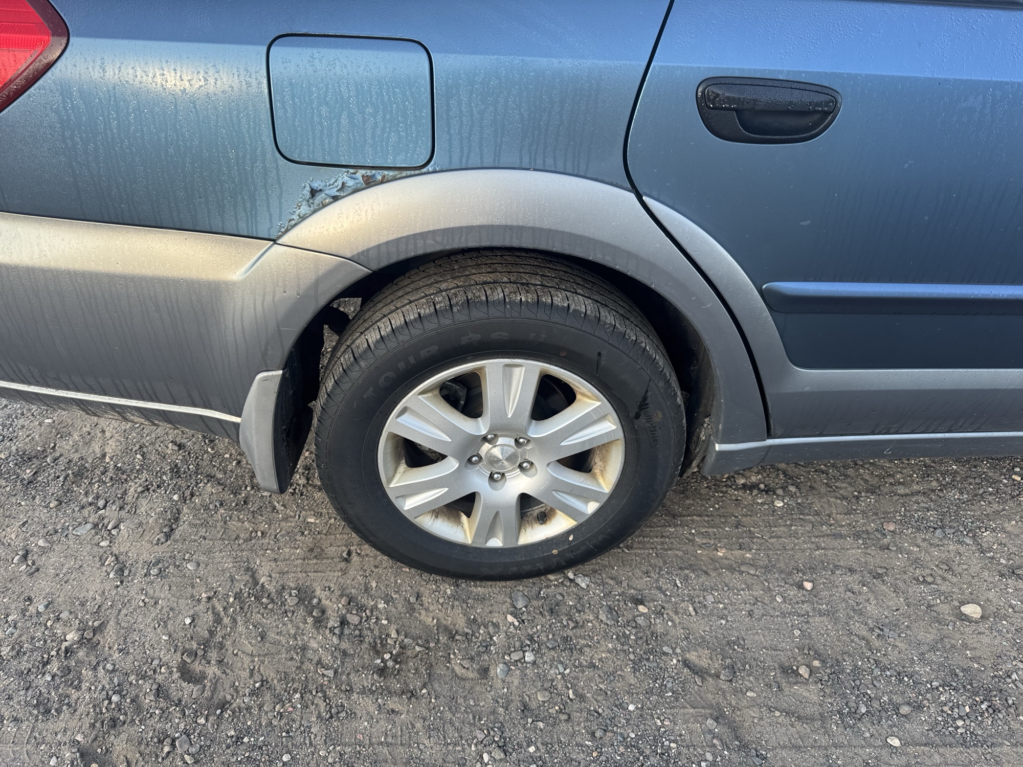 2005 subaru outback 2.5i-wagon with 182524 miles for sale near Elk River, Minnesota 106897_14_rear_pass_wheel.jpg