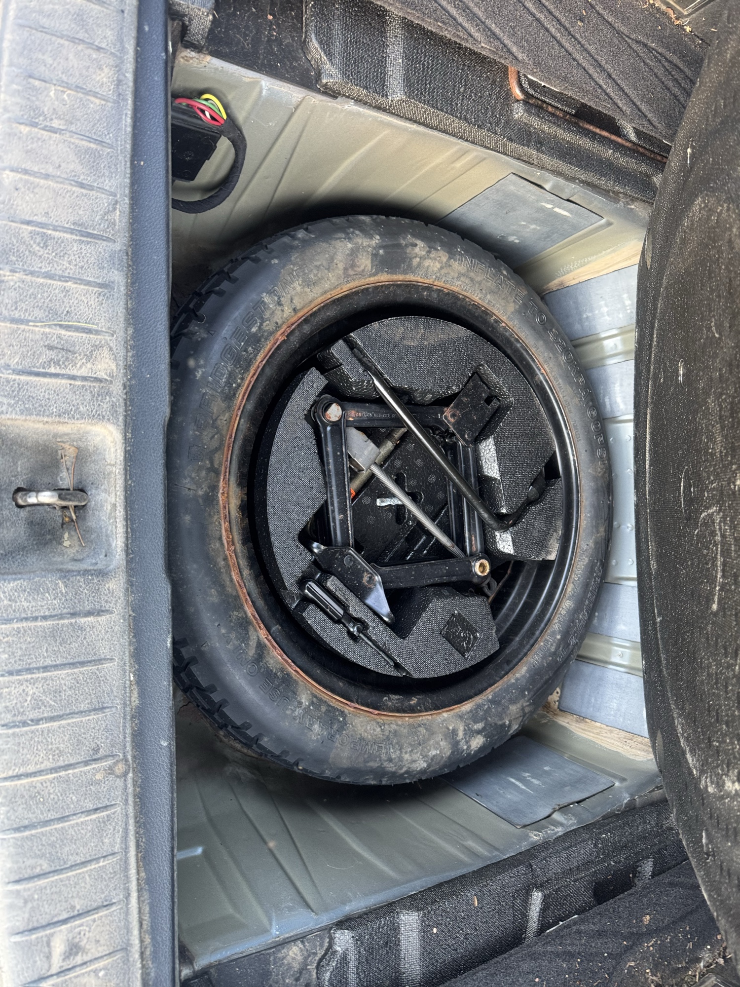 2005 subaru outback 2.5i-wagon with 182524 miles for sale near Elk River, Minnesota 106897_27_spare_tire.jpg