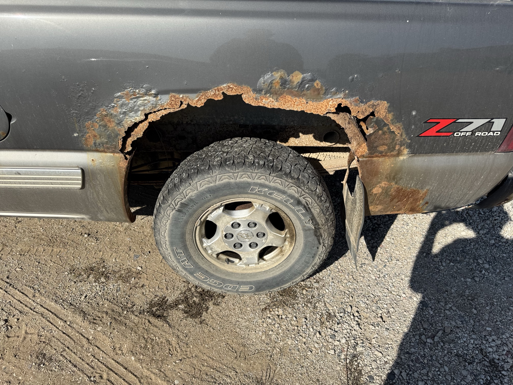 2000 chevrolet silverado-1500 ls-ext.-cab-3-door-long-bed-4wd with 201621 miles for sale near Elk River, Minnesota 106900_13_rear_drv_wheel.jpg