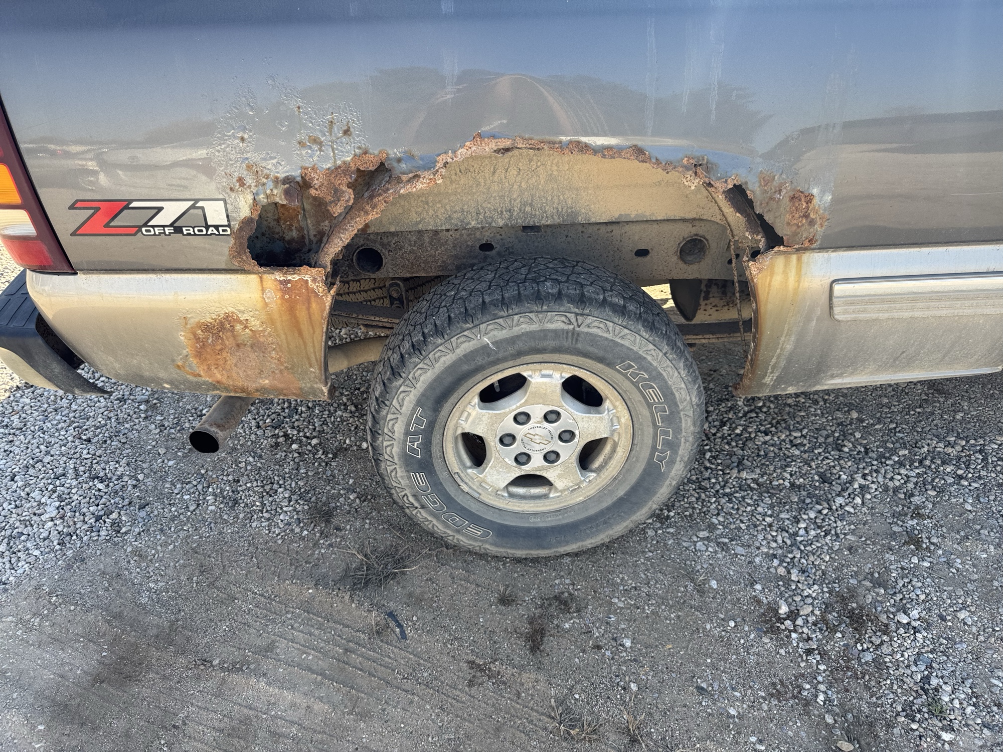 2000 chevrolet silverado-1500 ls-ext.-cab-3-door-long-bed-4wd with 201621 miles for sale near Elk River, Minnesota 106900_14_rear_pass_wheel.jpg