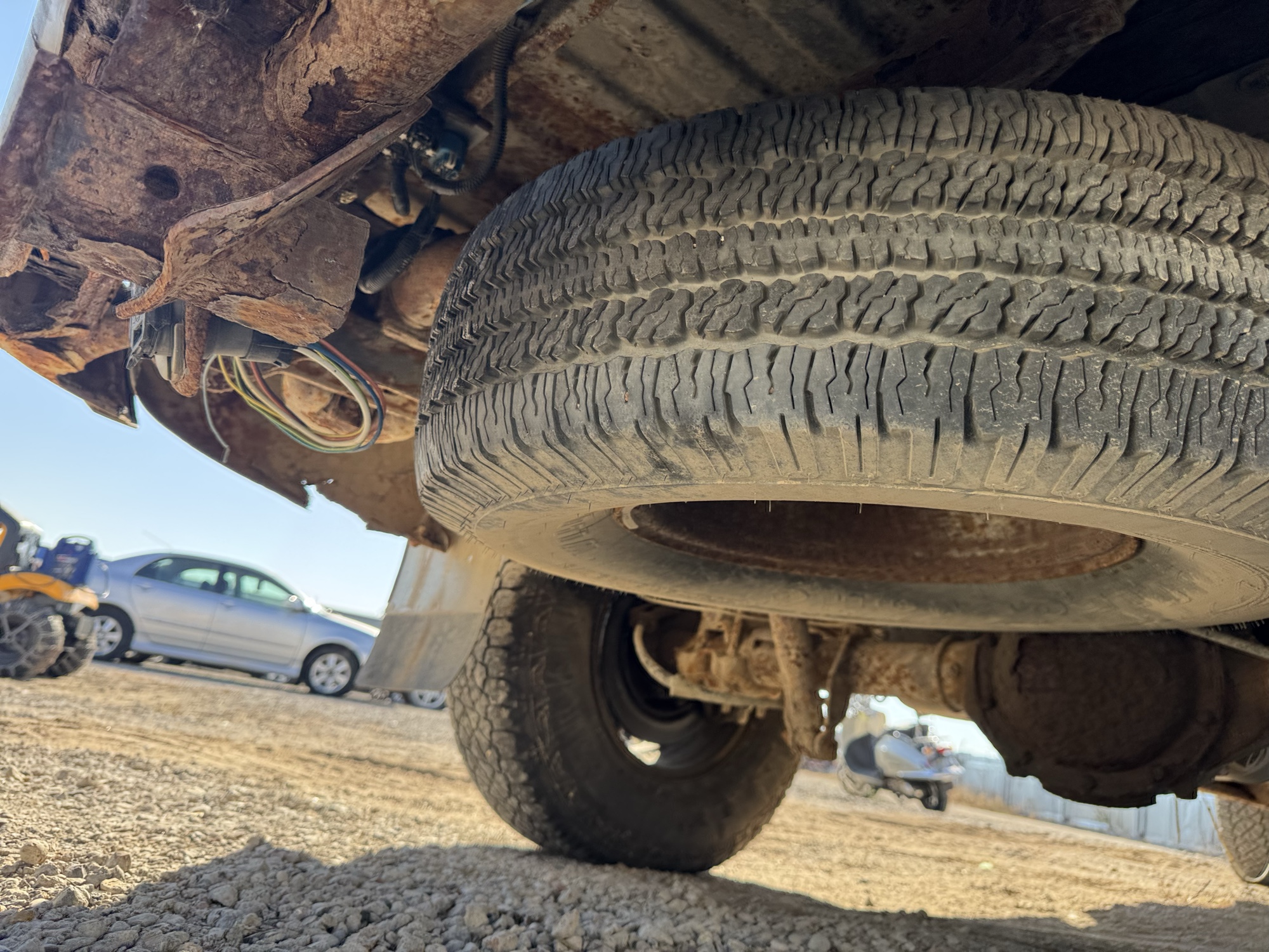 2000 chevrolet silverado-1500 ls-ext.-cab-3-door-long-bed-4wd with 201621 miles for sale near Elk River, Minnesota 106900_27_spare_tire.jpg