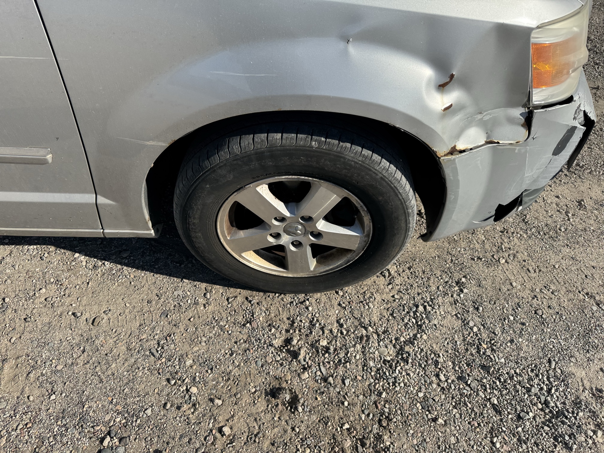 2009 dodge grand-caravan sxt with 228009 miles for sale near Elk River, Minnesota 106901_15_front_pass_wheel.jpg