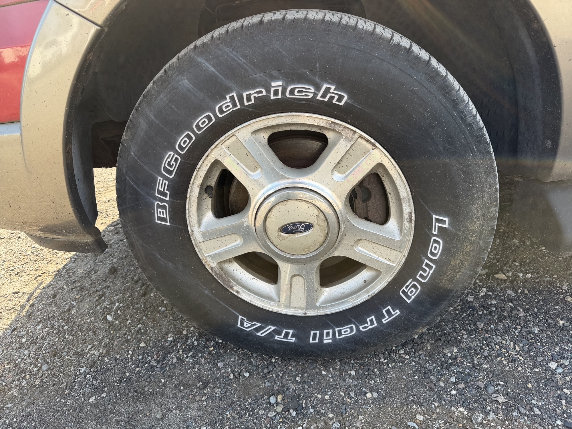 2003 ford expedition eddie-bauer-4wd with 185288 miles for sale near Elk River, Minnesota 106904_12_drv_front_wheel.jpg