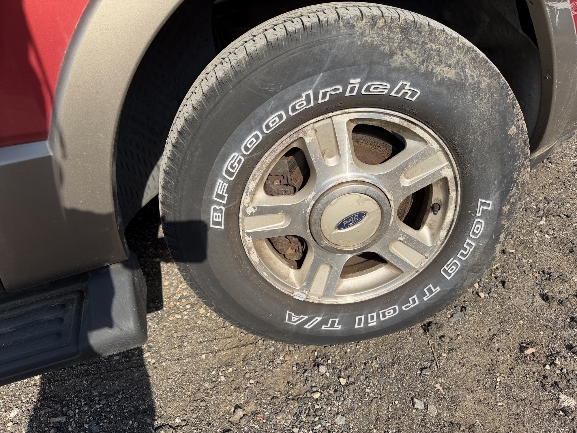 2003 ford expedition eddie-bauer-4wd with 185288 miles for sale near Elk River, Minnesota 106904_15_front_pass_wheel.jpg