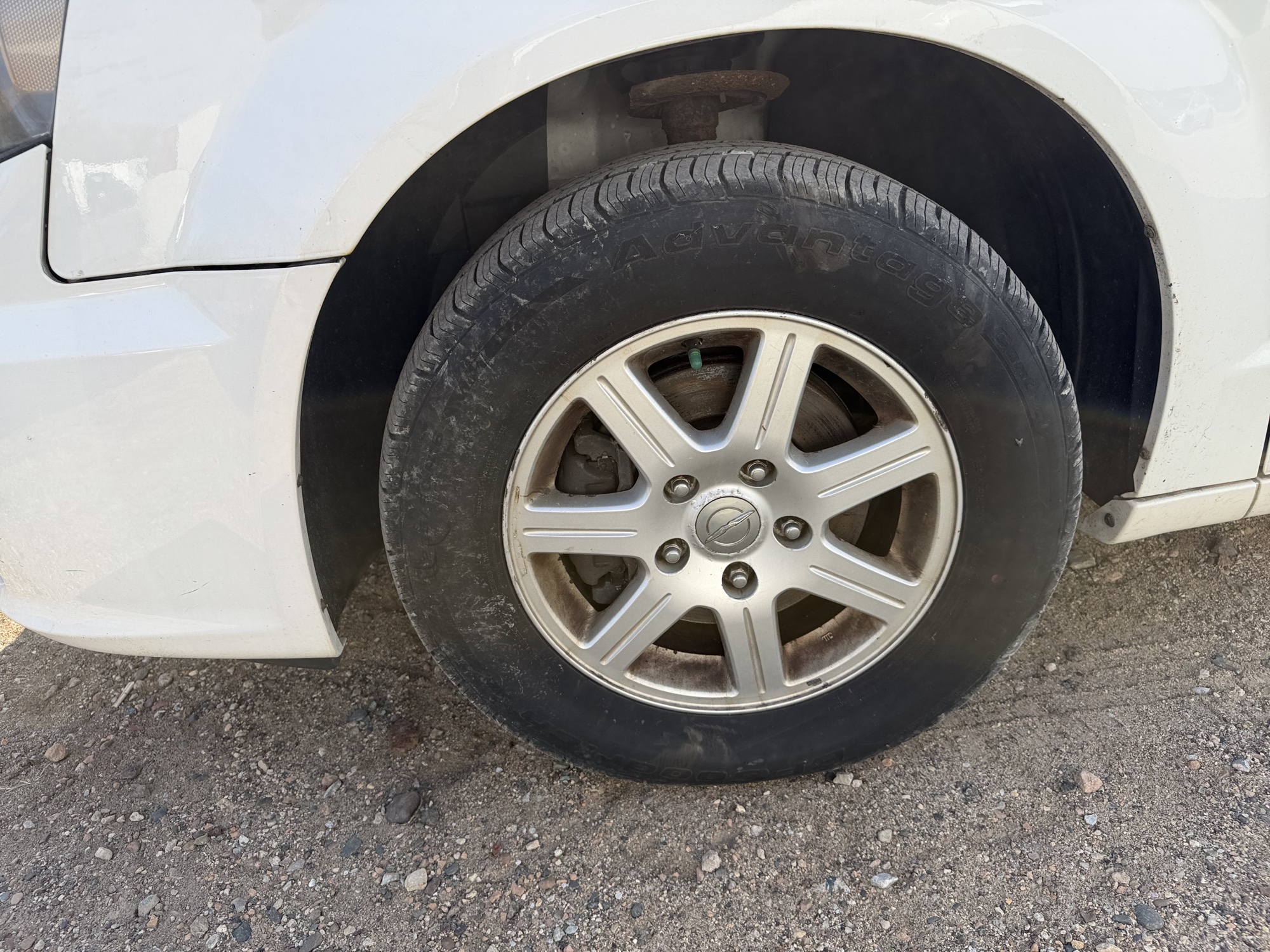 2011 chrysler town-and-country touring with 313810 miles for sale near Elk River, Minnesota 106906_12_drv_front_wheel.jpg