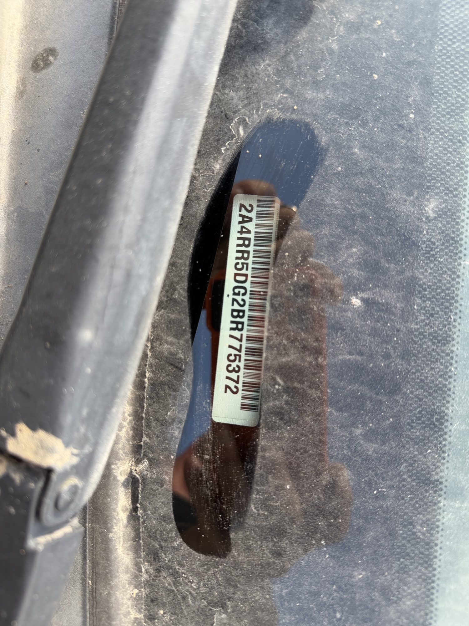 2011 chrysler town-and-country touring with 313810 miles for sale near Elk River, Minnesota 106906_48_windshield_vin_plate.jpg