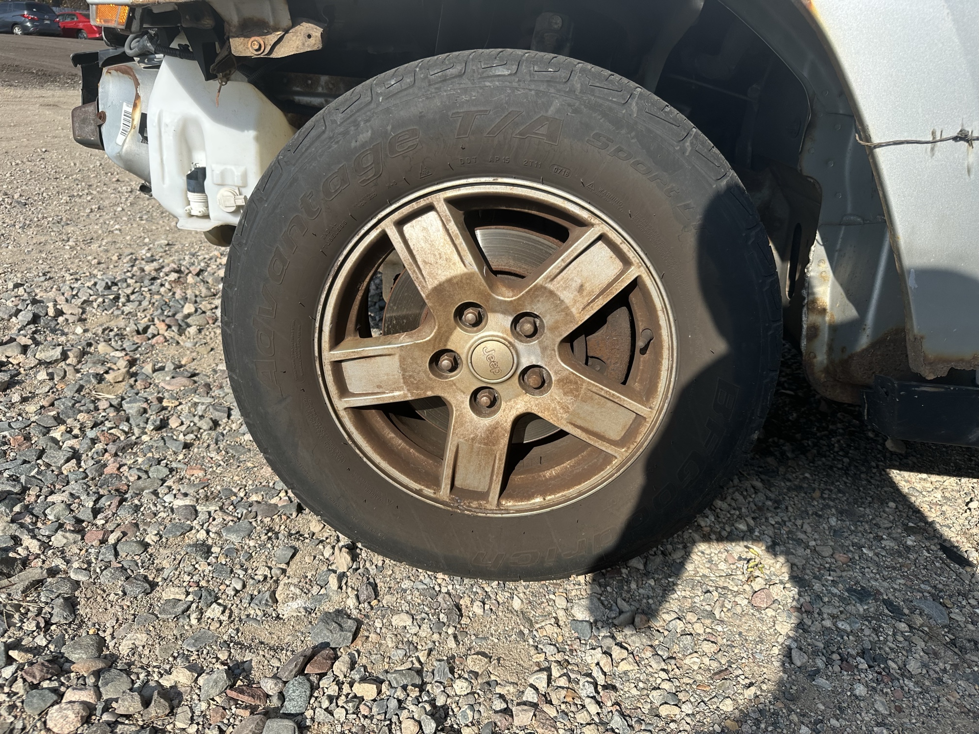 2005 jeep grand-cherokee laredo-4wd for sale near Elk River, Minnesota 106910_12_drv_front_wheel.jpg