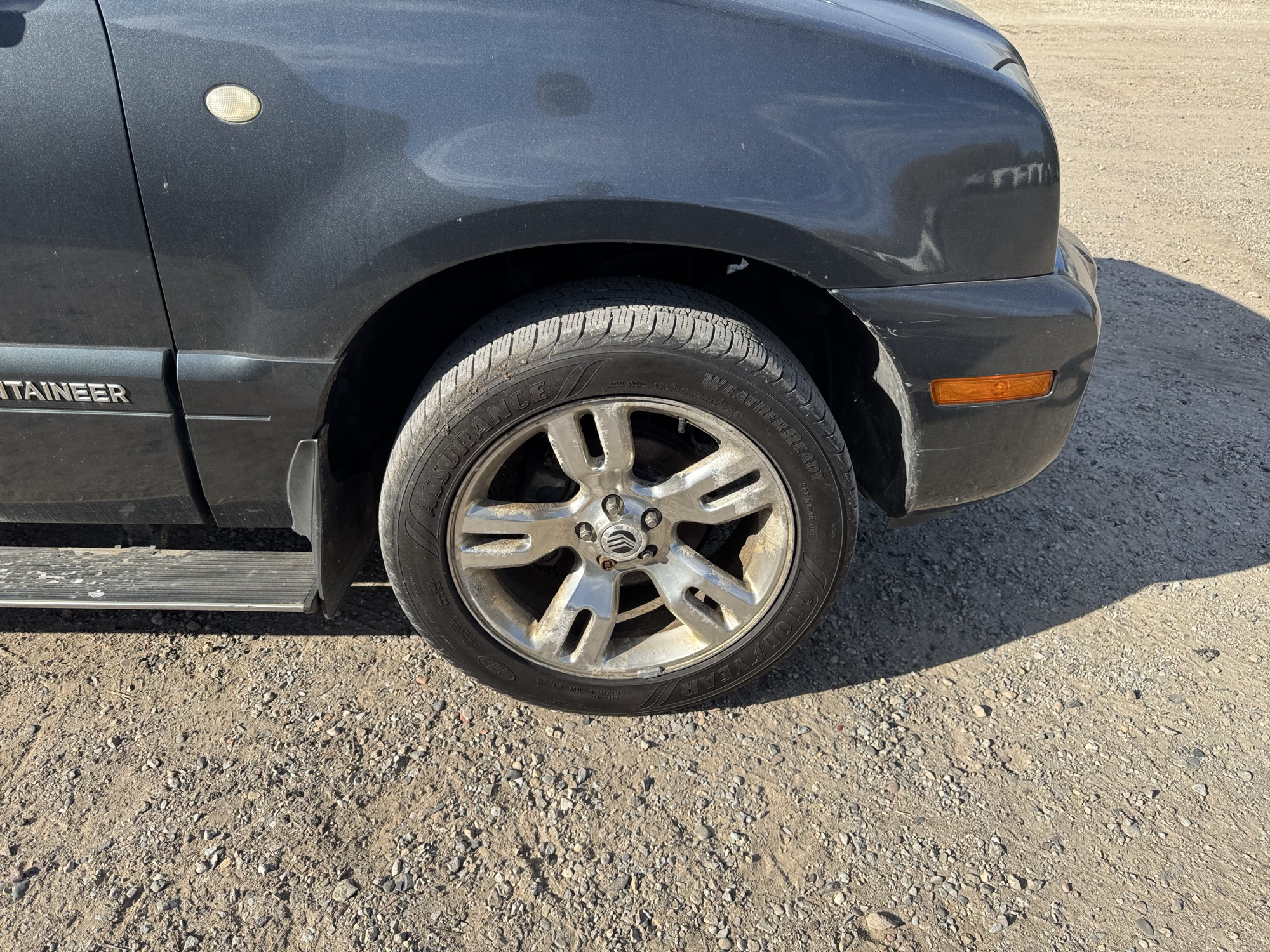 2010 mercury mountaineer premier-4.0l-awd with 95037 miles for sale near Elk River, Minnesota 106914_15_front_pass_wheel.jpg