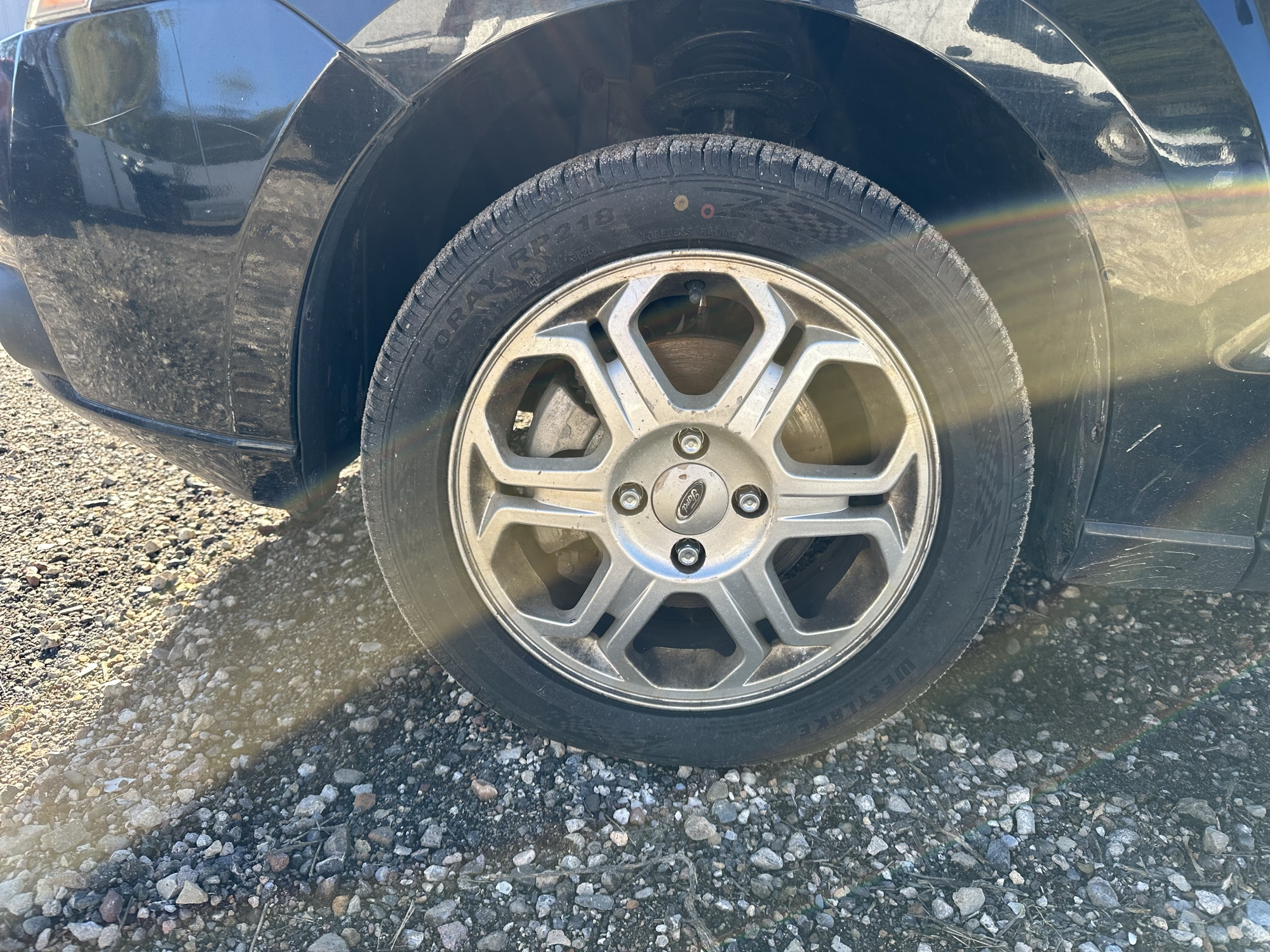 2009 ford focus ses-sedan with 214252 miles for sale near Elk River, Minnesota 106931_12_drv_front_wheel.jpg