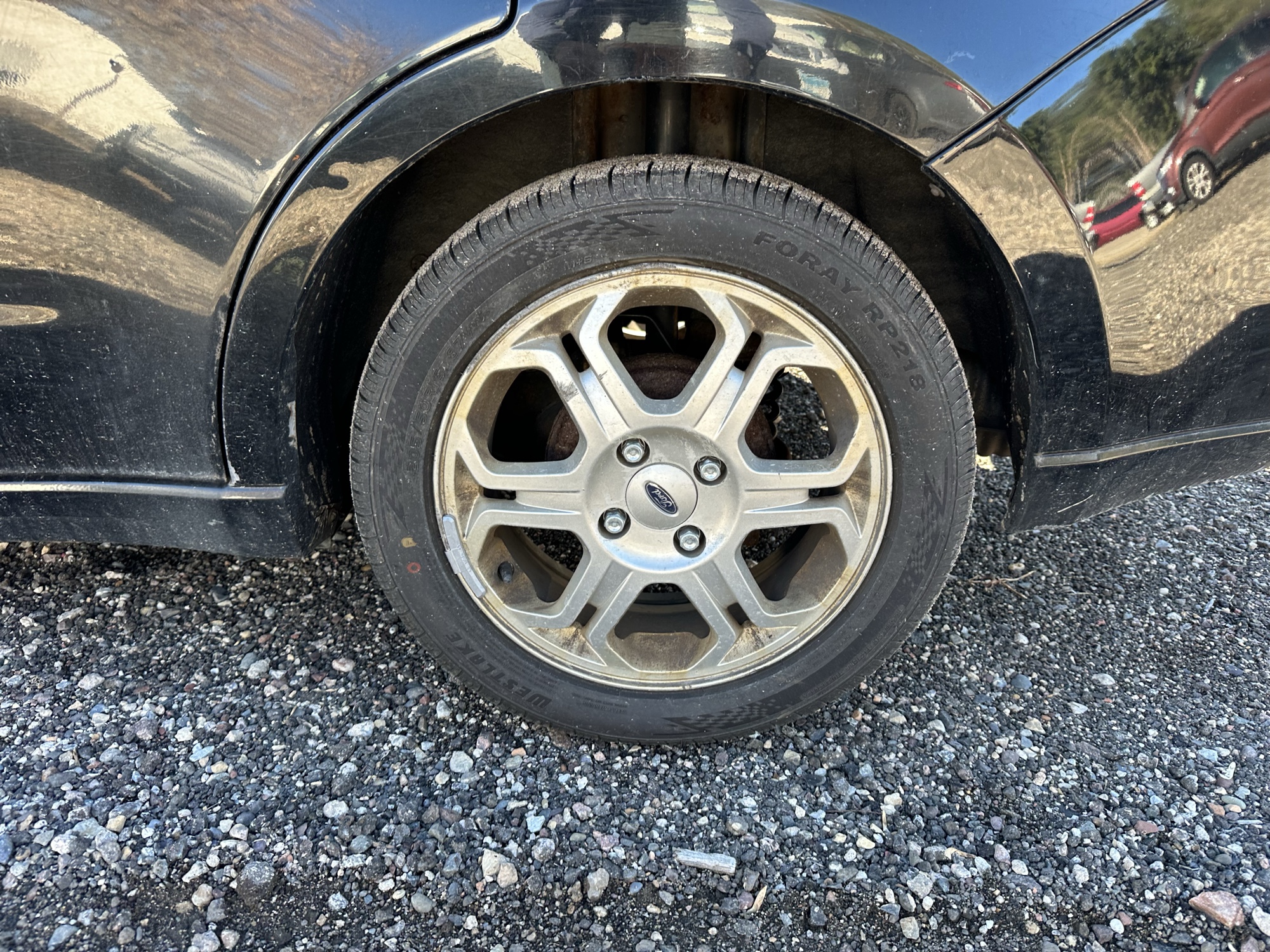 2009 ford focus ses-sedan with 214252 miles for sale near Elk River, Minnesota 106931_13_rear_drv_wheel.jpg
