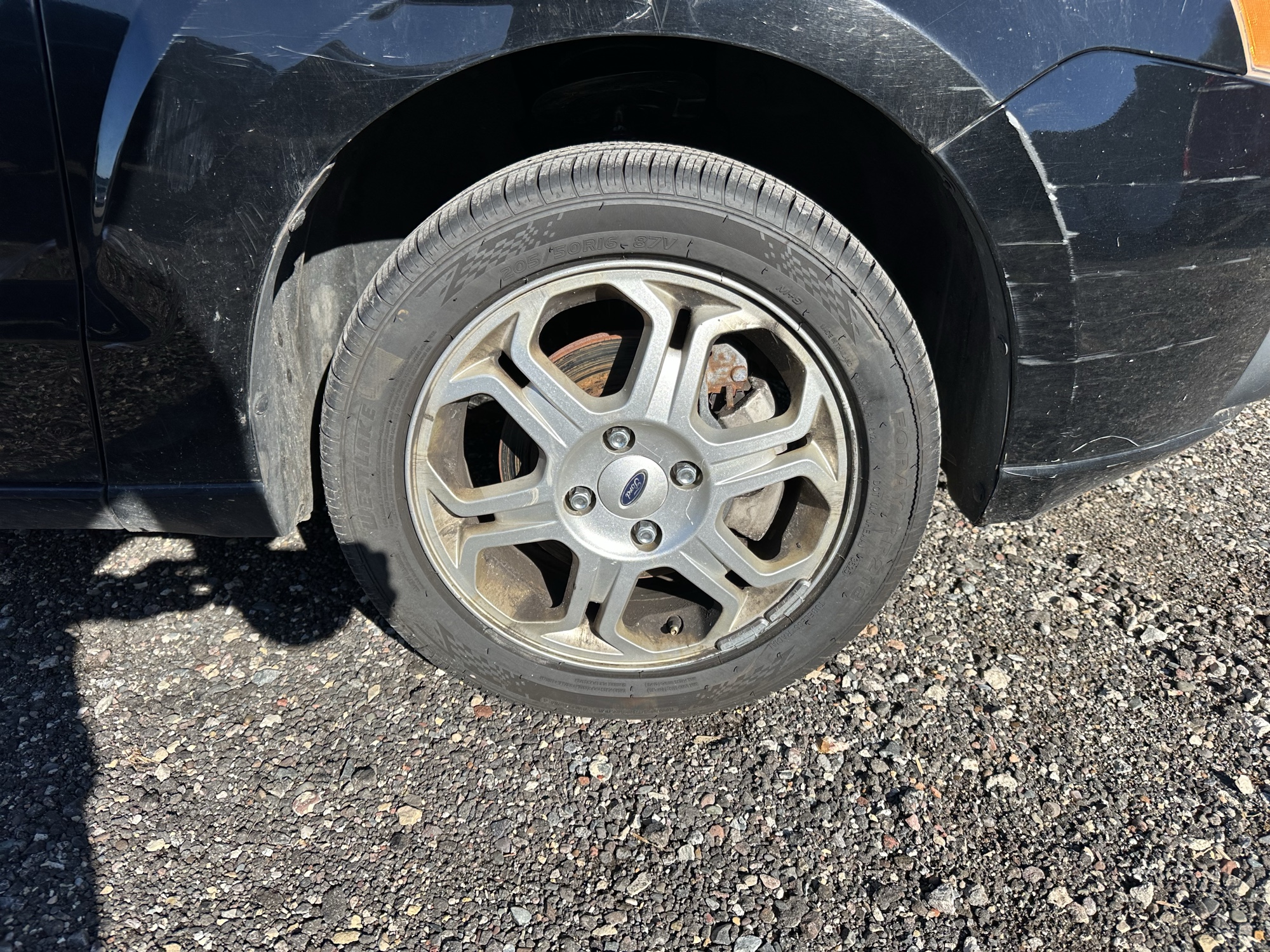 2009 ford focus ses-sedan with 214252 miles for sale near Elk River, Minnesota 106931_15_front_pass_wheel.jpg