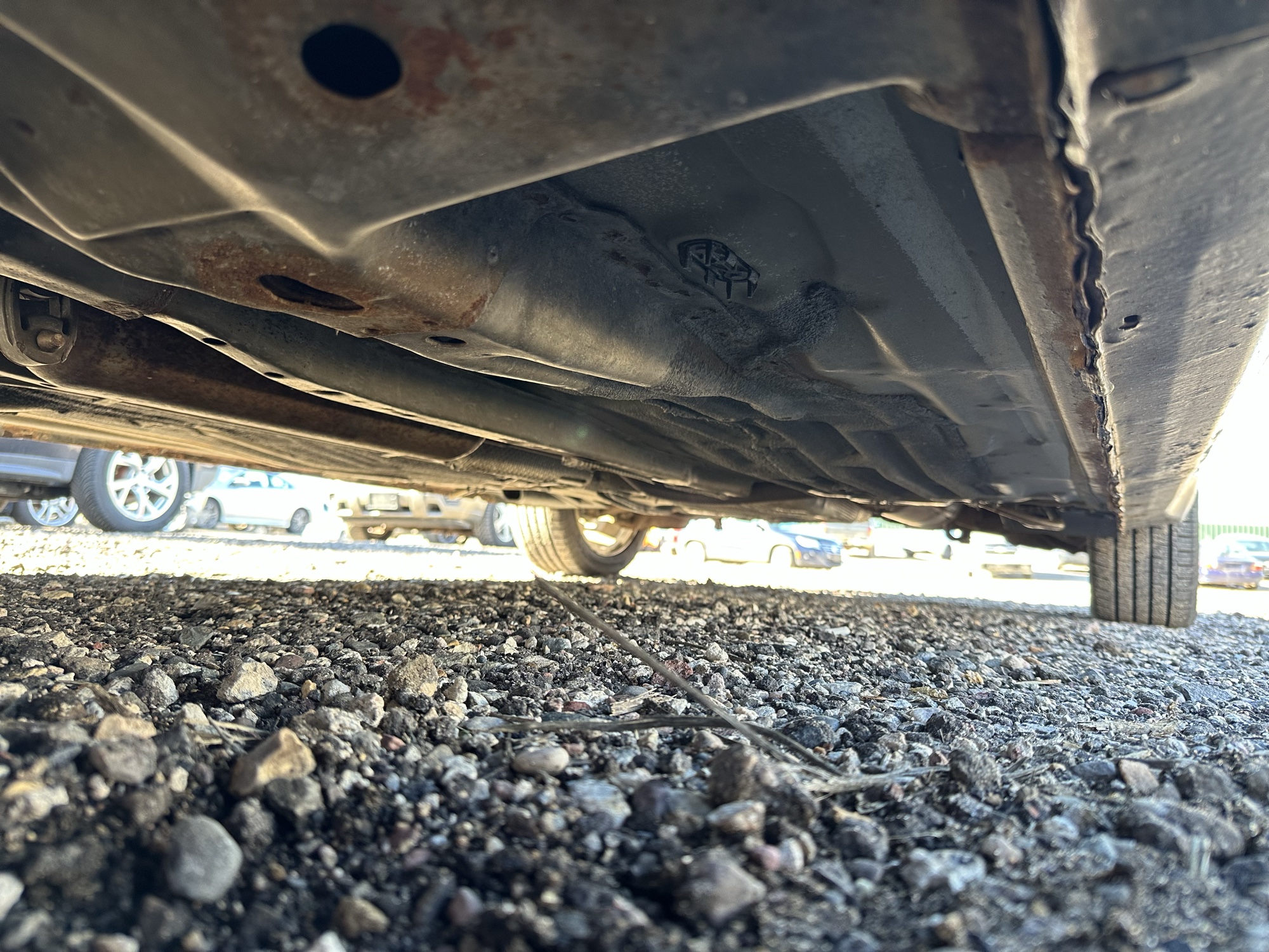2009 ford focus ses-sedan with 214252 miles for sale near Elk River, Minnesota 106931_17_undercar_drv_side.jpg