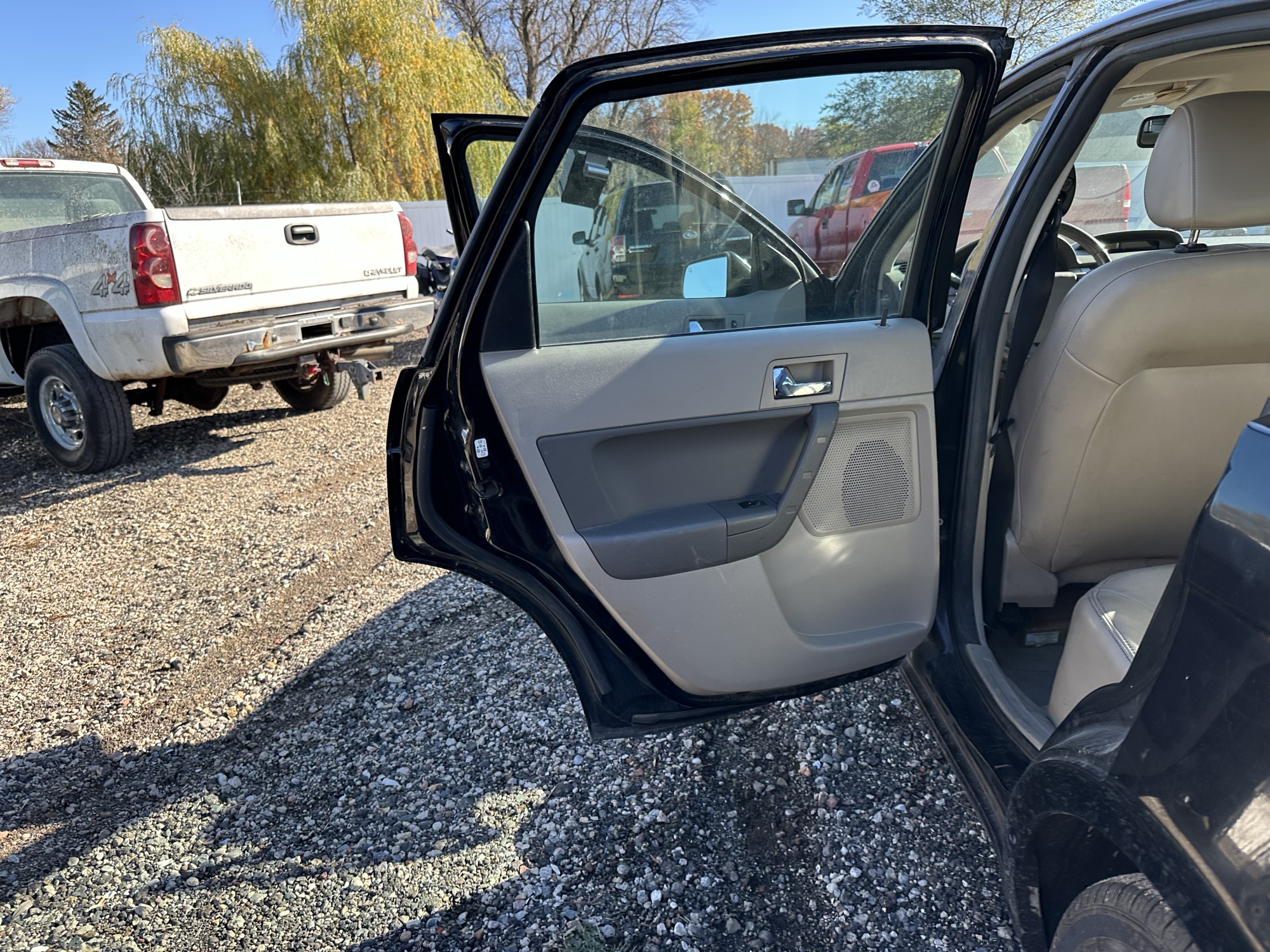 2009 ford focus ses-sedan with 214252 miles for sale near Elk River, Minnesota 106931_25_drv_rear_door_panel.jpg