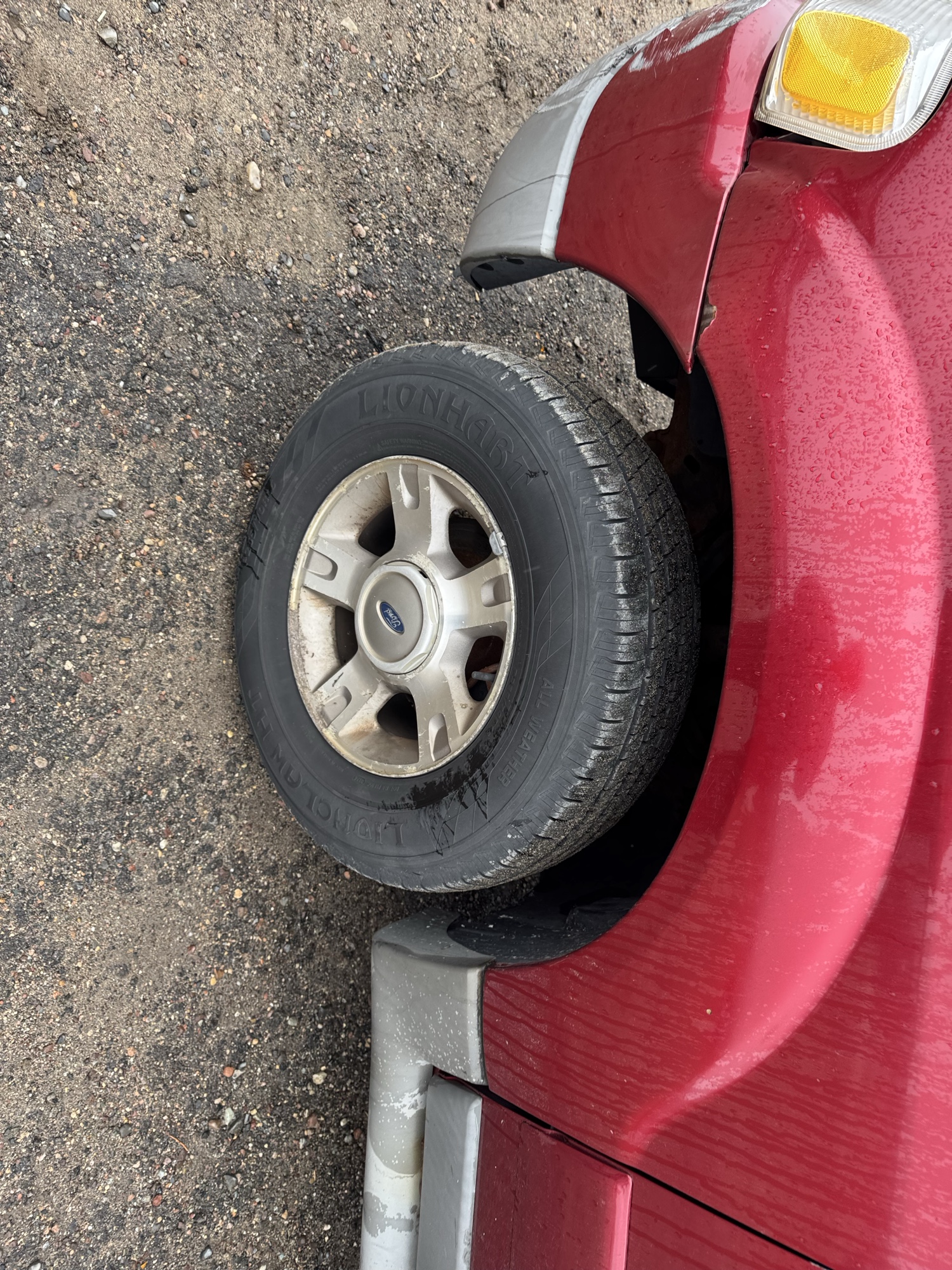 2003 ford explorer-sport xls-4wd with 199208 miles for sale near Elk River, Minnesota 106932_12_drv_front_wheel.jpg