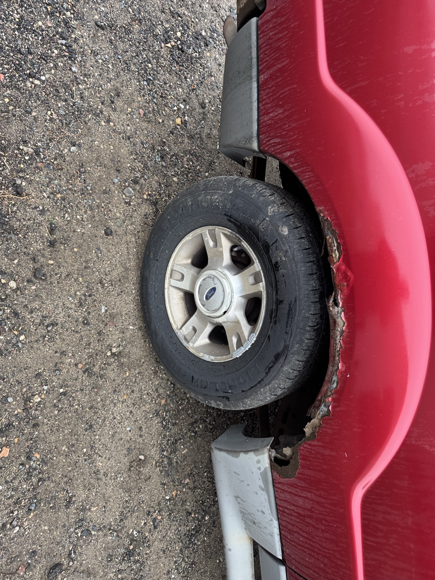 2003 ford explorer-sport xls-4wd with 199208 miles for sale near Elk River, Minnesota 106932_14_rear_pass_wheel.jpg