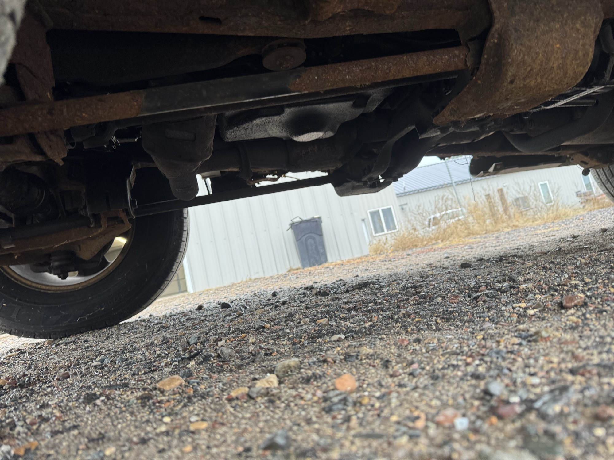 2003 ford explorer-sport xls-4wd with 199208 miles for sale near Elk River, Minnesota 106932_17_undercar_drv_side.jpg