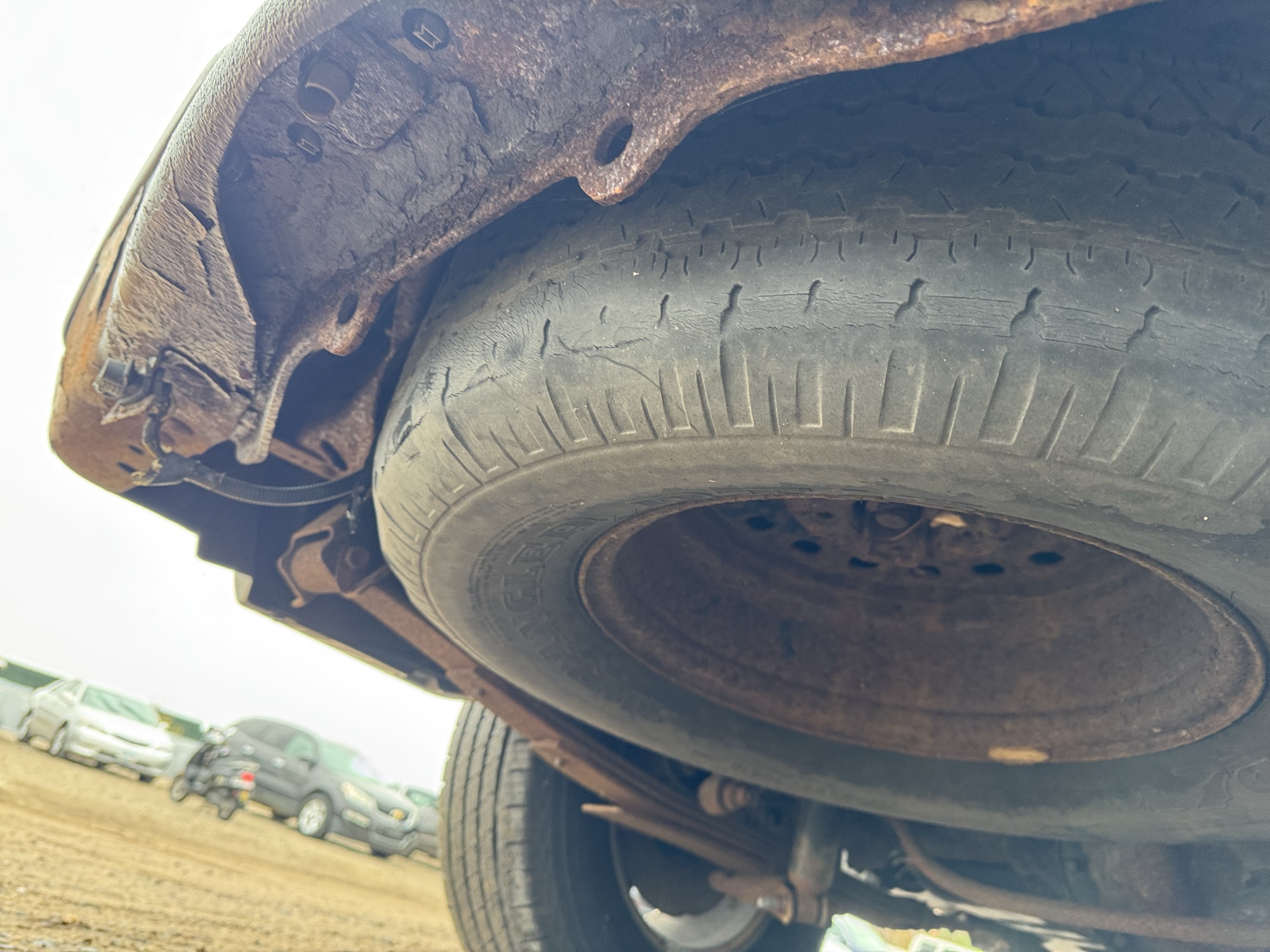 2003 ford explorer-sport xls-4wd with 199208 miles for sale near Elk River, Minnesota 106932_27_spare_tire.jpg