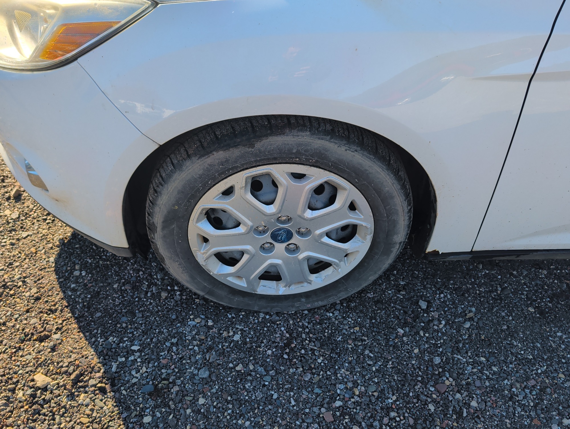 2012 ford focus se-sedan with 261316 miles for sale near Elk River, Minnesota 106936_12_drv_front_wheel.jpg
