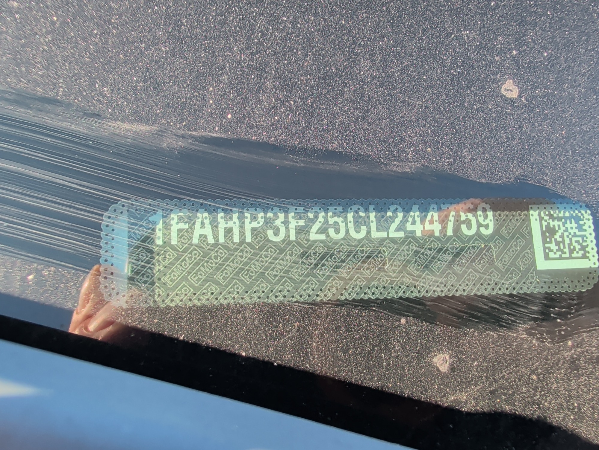 2012 ford focus se-sedan with 261316 miles for sale near Elk River, Minnesota 106936_48_windshield_vin_plate.jpg