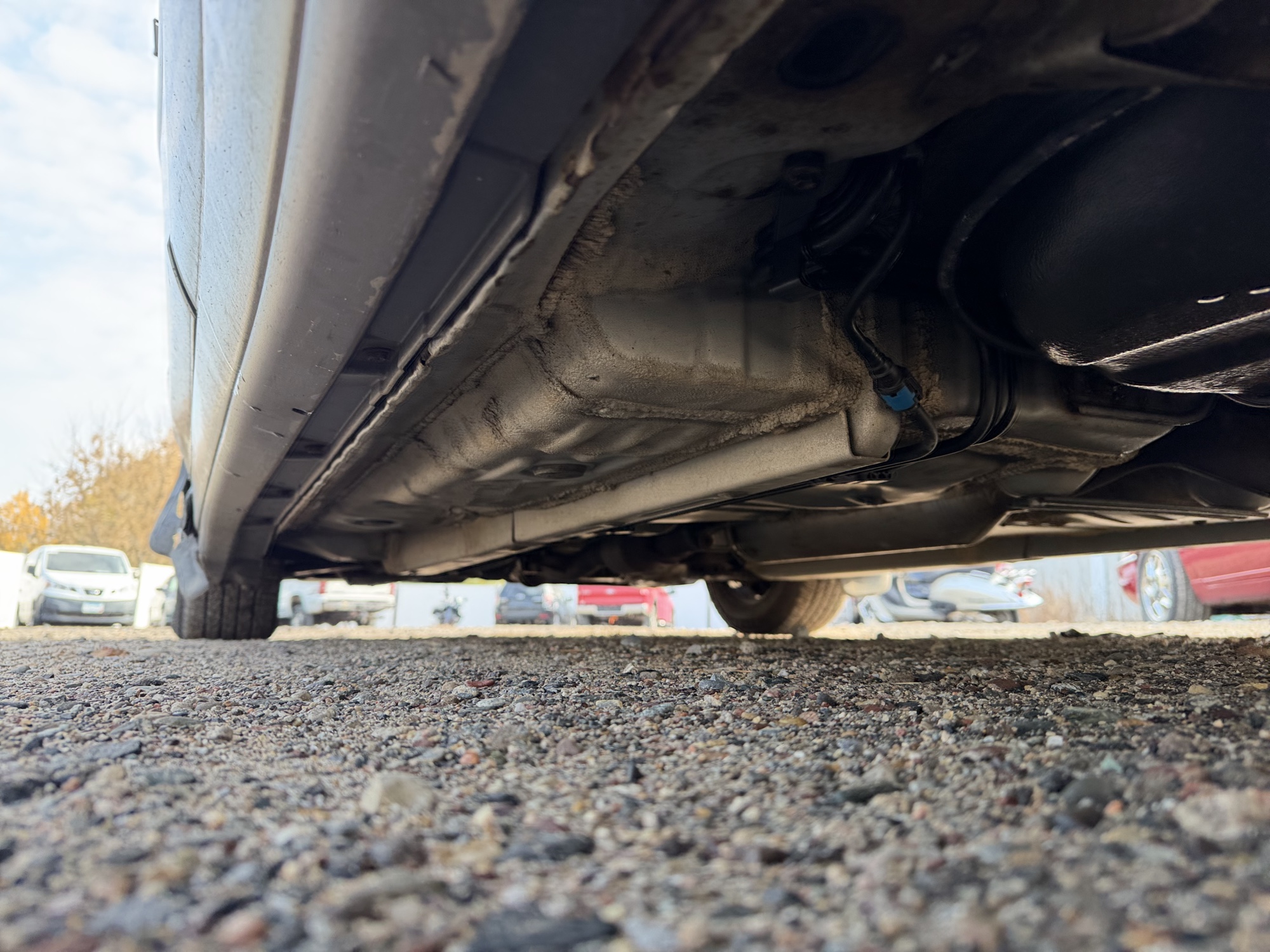 2005 toyota camry le with 145231 miles for sale near Elk River, Minnesota 106937_18_undercar_rear_drv.jpg